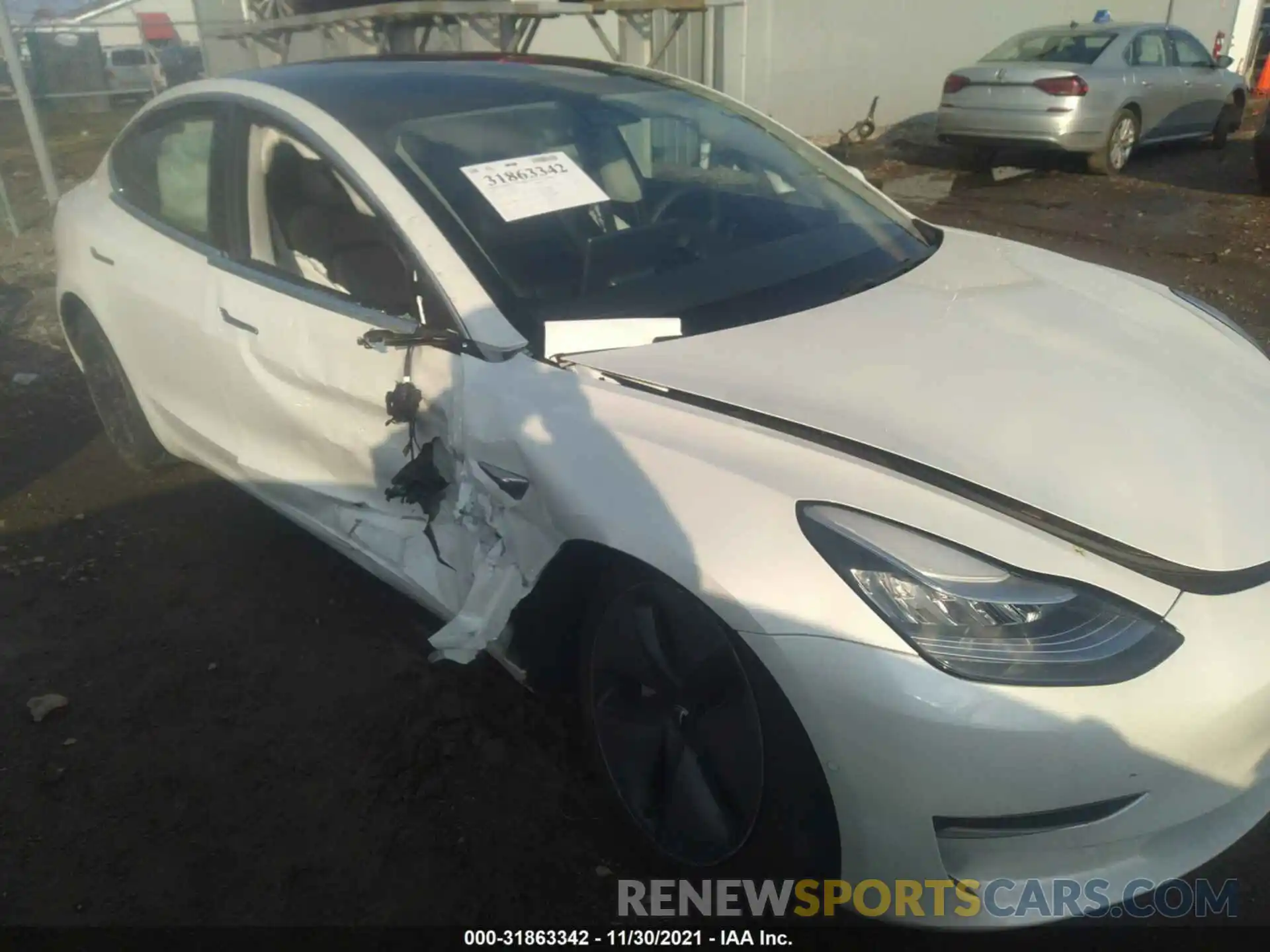 6 Photograph of a damaged car 5YJ3E1EA2LF706303 TESLA MODEL 3 2020