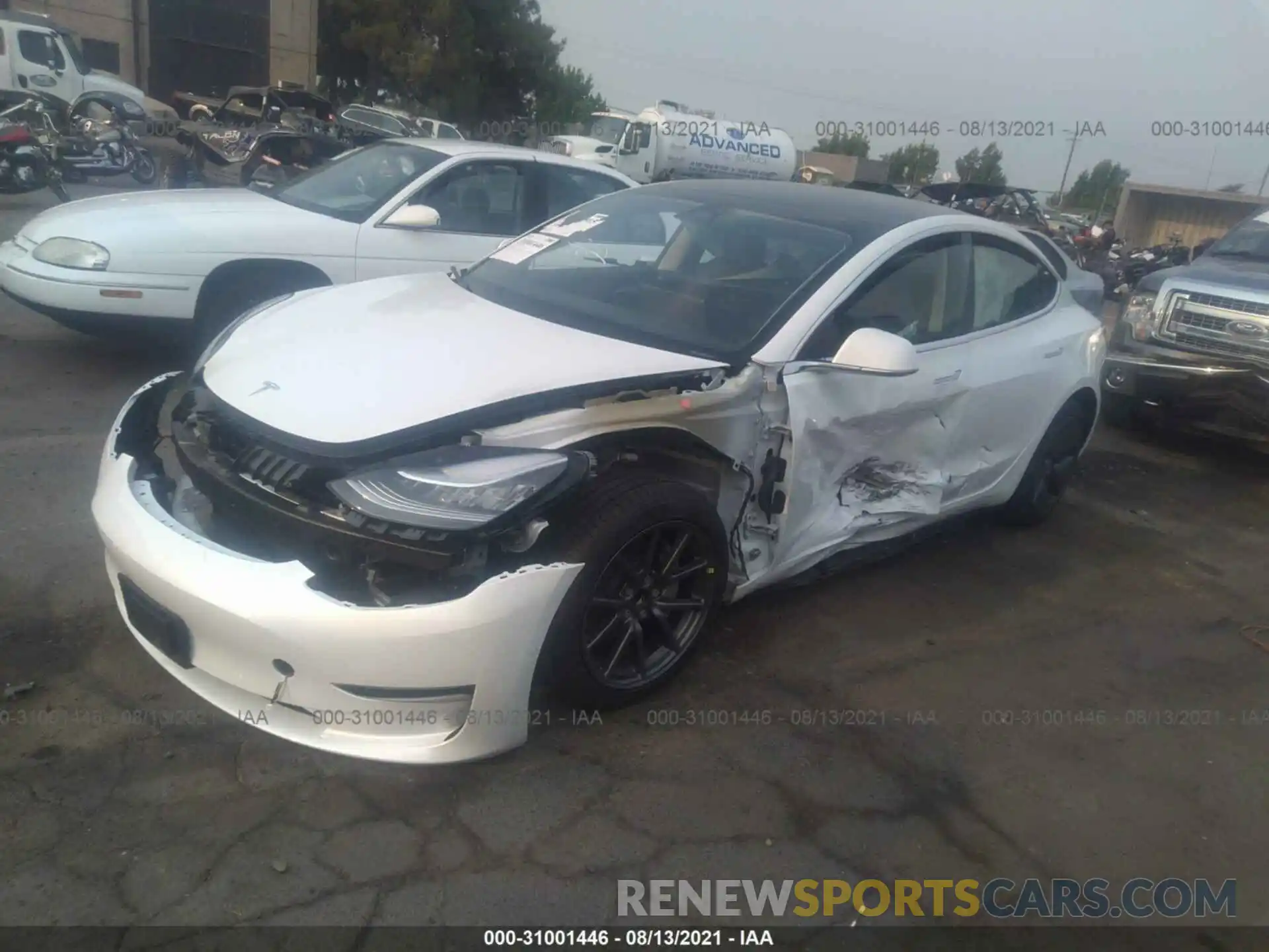 2 Photograph of a damaged car 5YJ3E1EA2LF706494 TESLA MODEL 3 2020