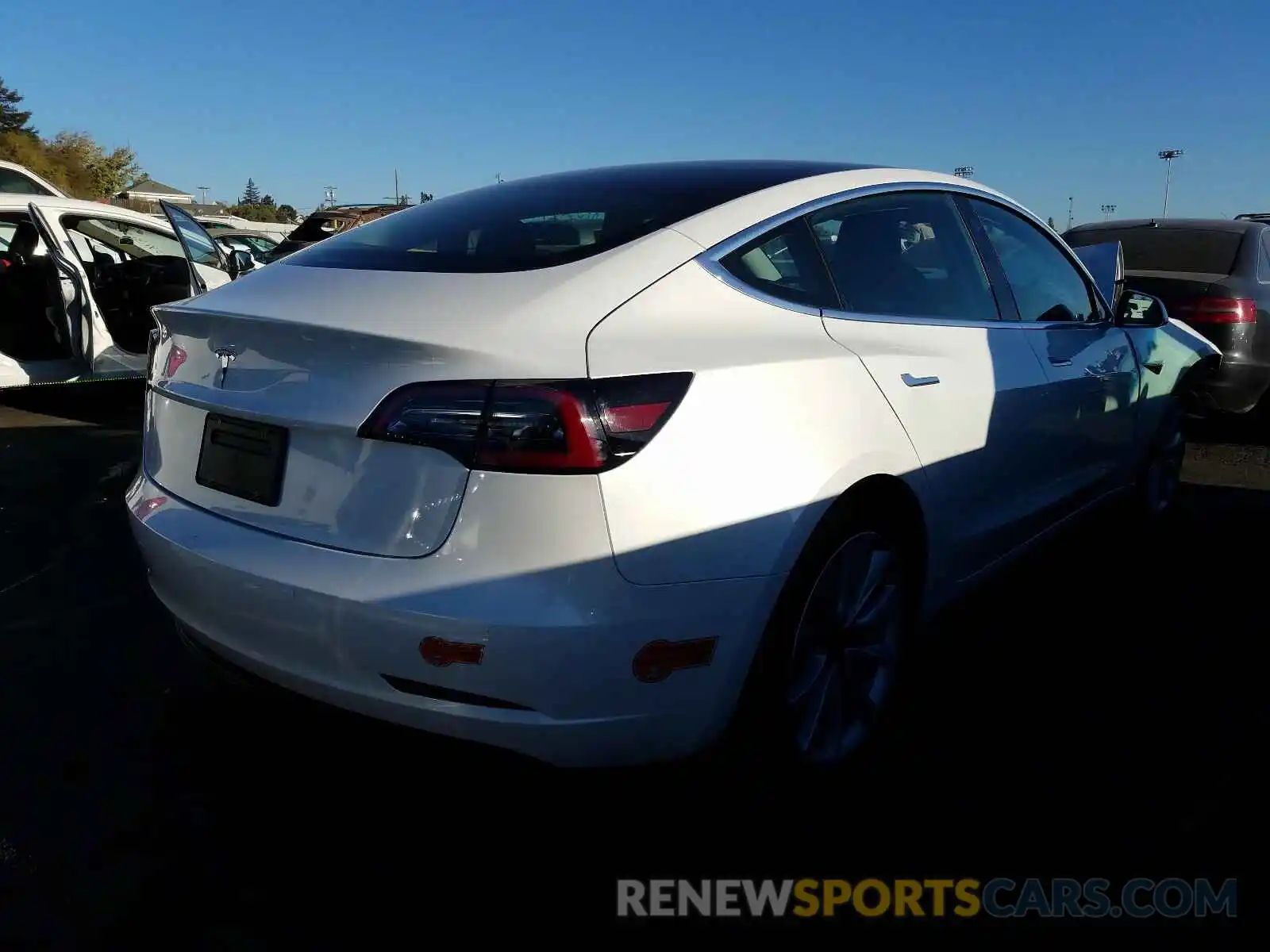 4 Photograph of a damaged car 5YJ3E1EA2LF709007 TESLA MODEL 3 2020