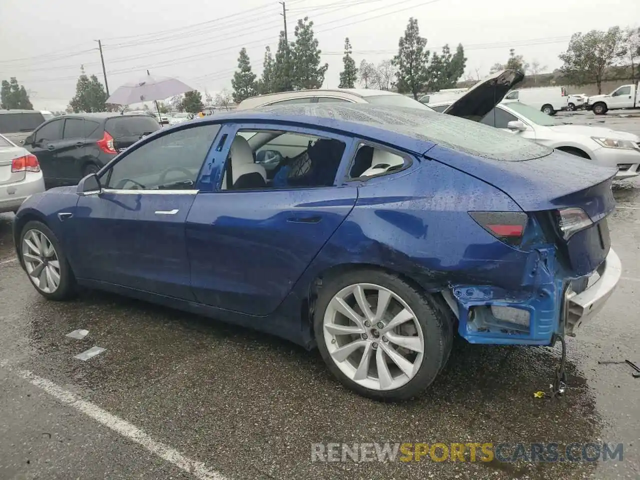 2 Photograph of a damaged car 5YJ3E1EA2LF710285 TESLA MODEL 3 2020