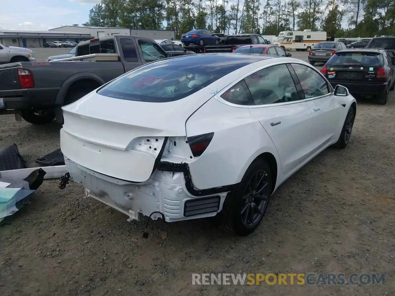 4 Photograph of a damaged car 5YJ3E1EA2LF717866 TESLA MODEL 3 2020