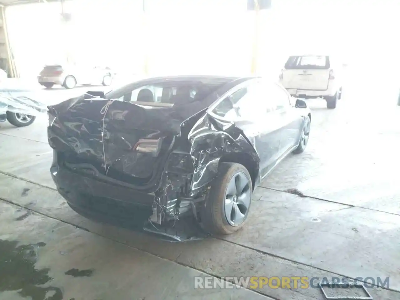 4 Photograph of a damaged car 5YJ3E1EA2LF743304 TESLA MODEL 3 2020