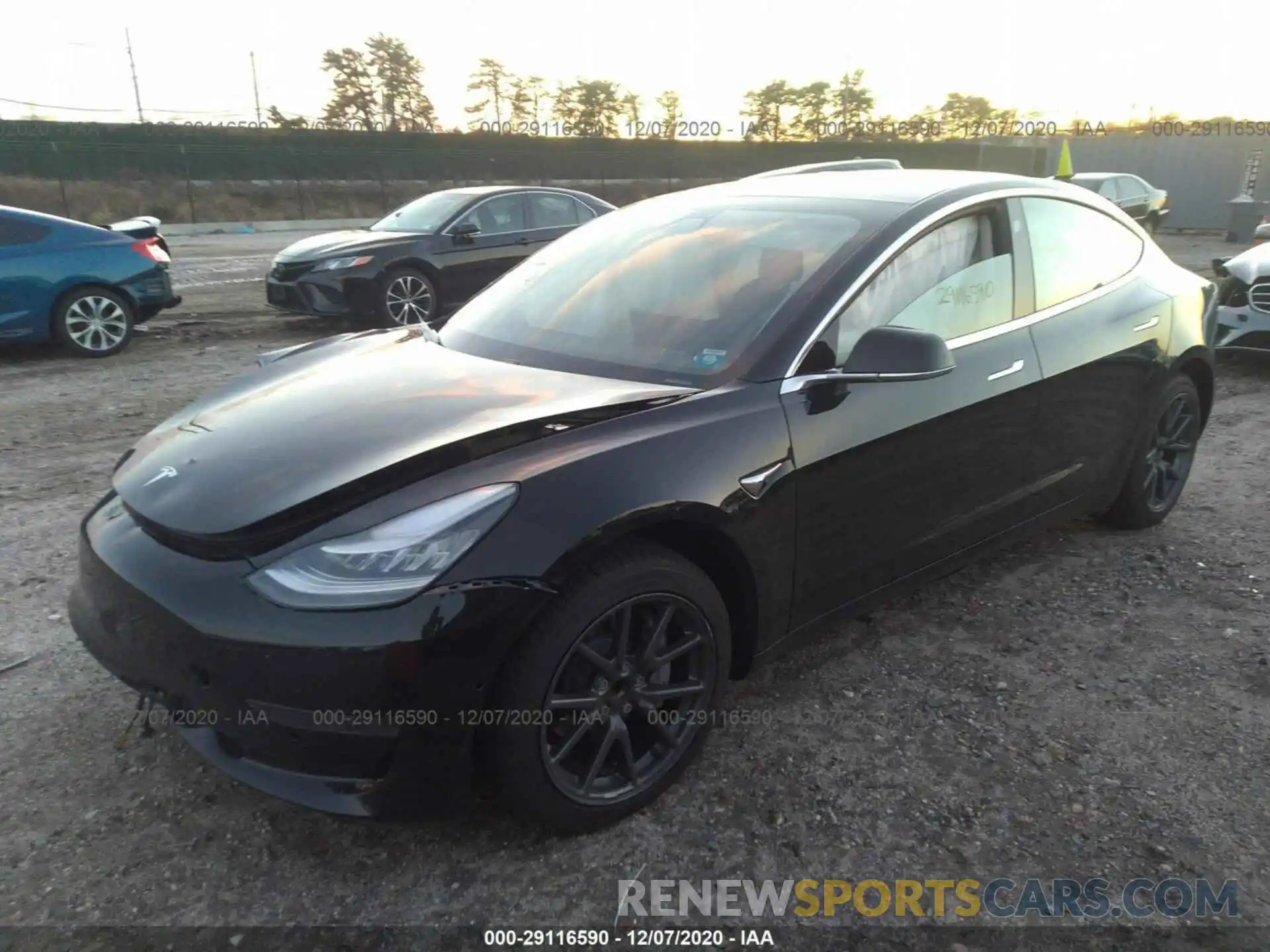 2 Photograph of a damaged car 5YJ3E1EA2LF792146 TESLA MODEL 3 2020