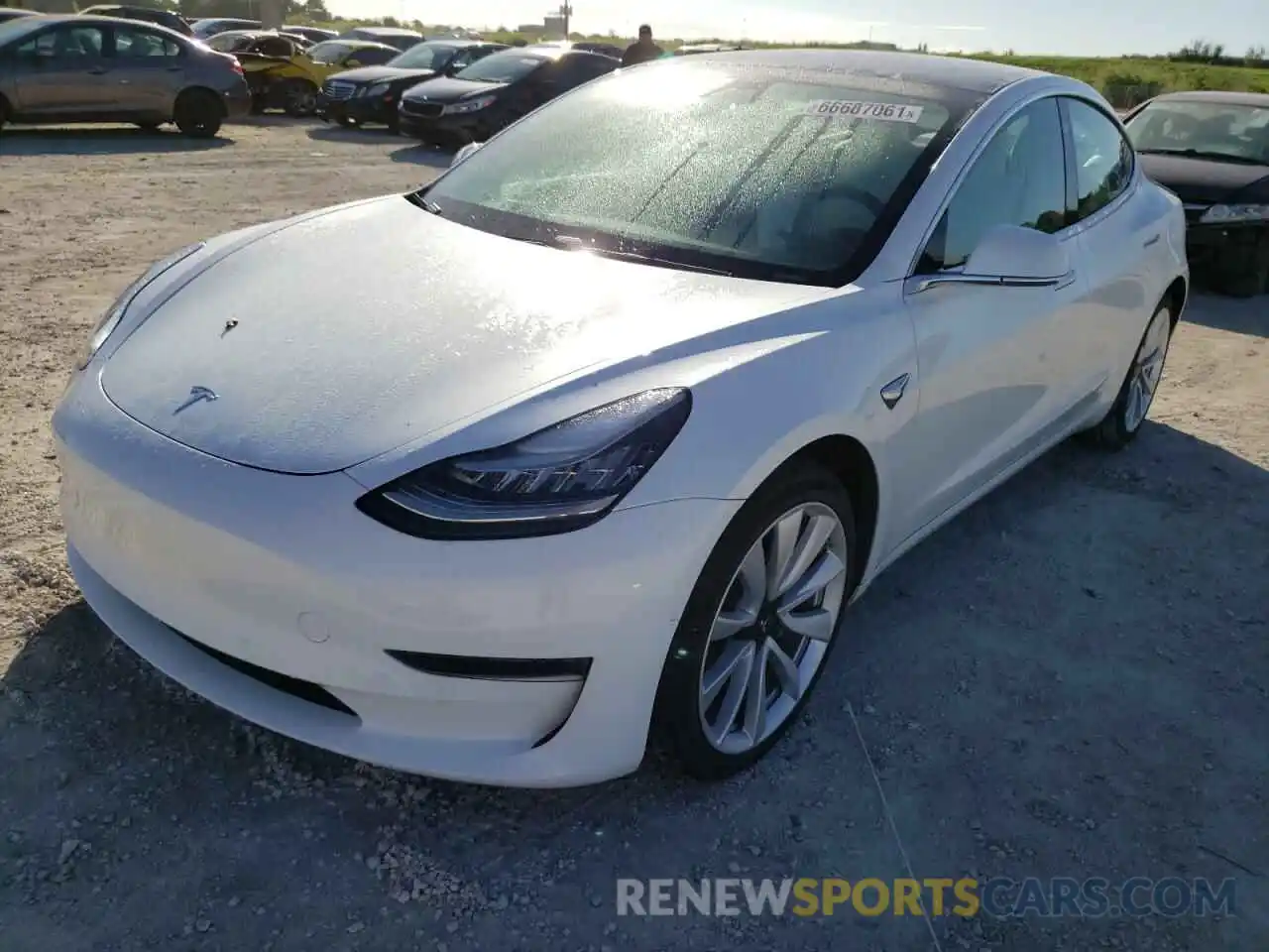 2 Photograph of a damaged car 5YJ3E1EA2LF793460 TESLA MODEL 3 2020