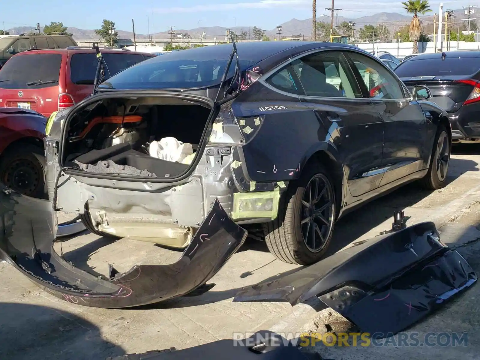 4 Photograph of a damaged car 5YJ3E1EA2LF796844 TESLA MODEL 3 2020