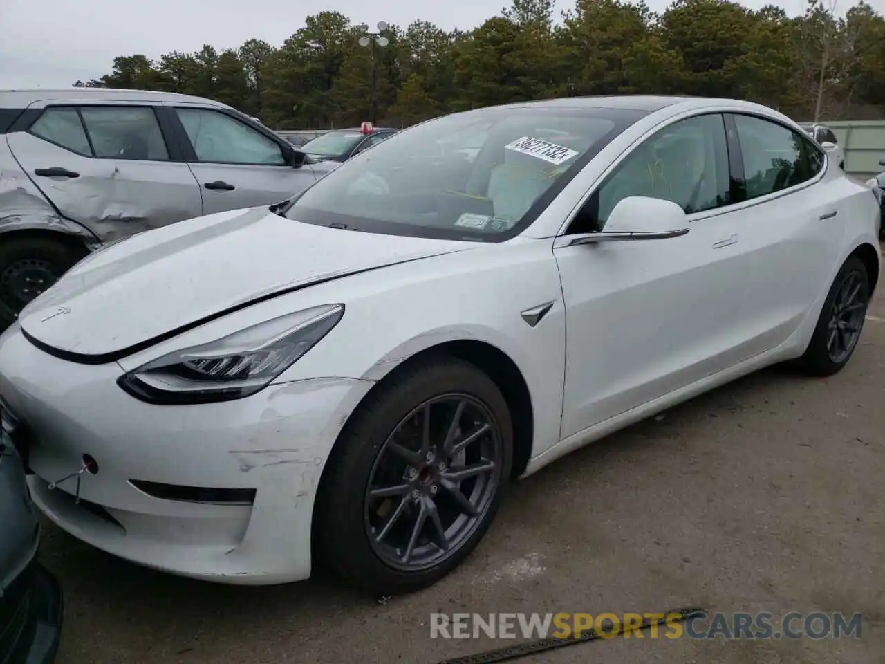 2 Photograph of a damaged car 5YJ3E1EA2LF797833 TESLA MODEL 3 2020