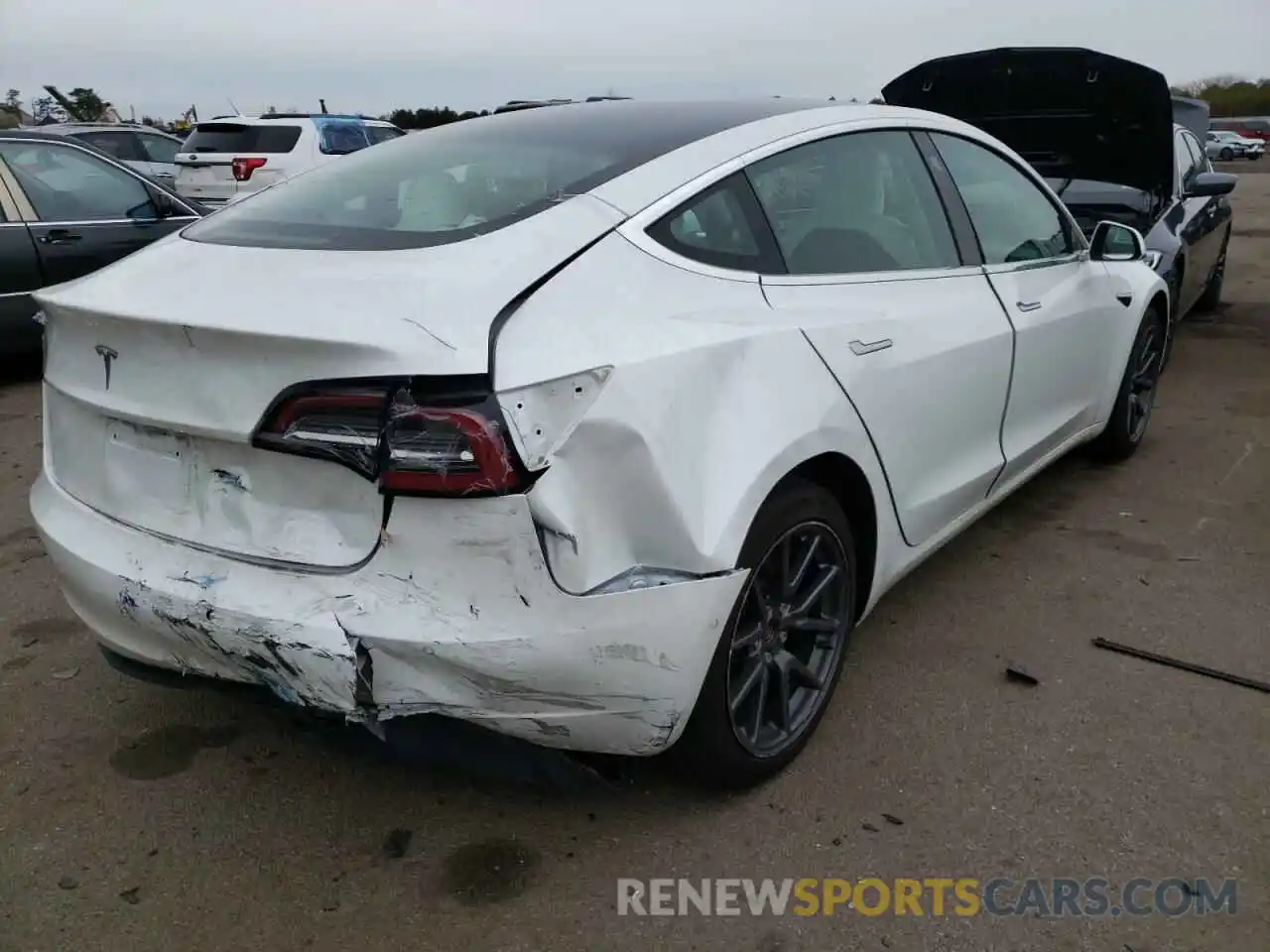 4 Photograph of a damaged car 5YJ3E1EA2LF797833 TESLA MODEL 3 2020