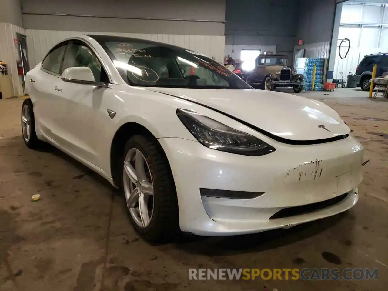 1 Photograph of a damaged car 5YJ3E1EA2LF797962 TESLA MODEL 3 2020