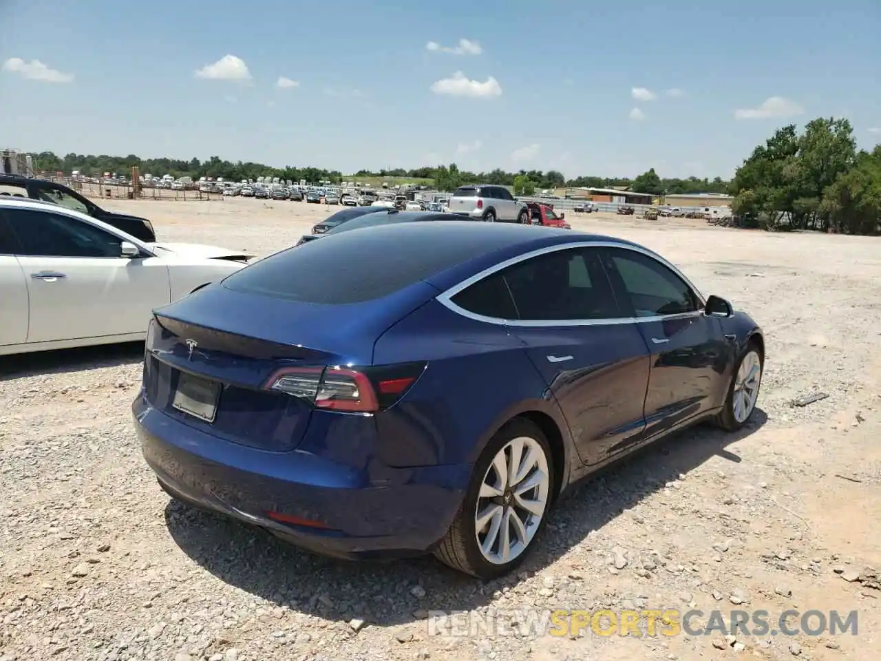 4 Photograph of a damaged car 5YJ3E1EA2LF802335 TESLA MODEL 3 2020