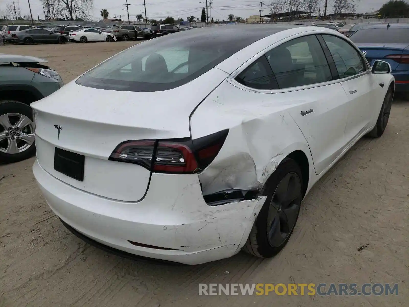 4 Photograph of a damaged car 5YJ3E1EA2LF805817 TESLA MODEL 3 2020