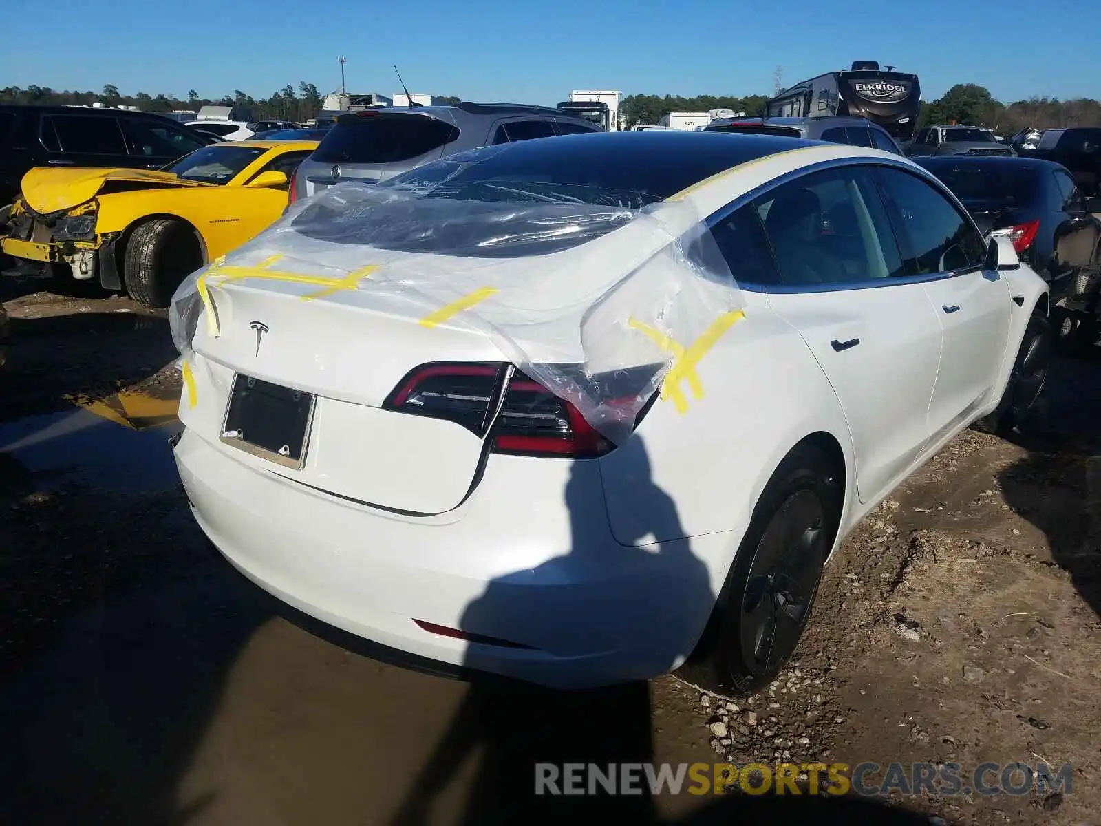 4 Photograph of a damaged car 5YJ3E1EA3LF504392 TESLA MODEL 3 2020