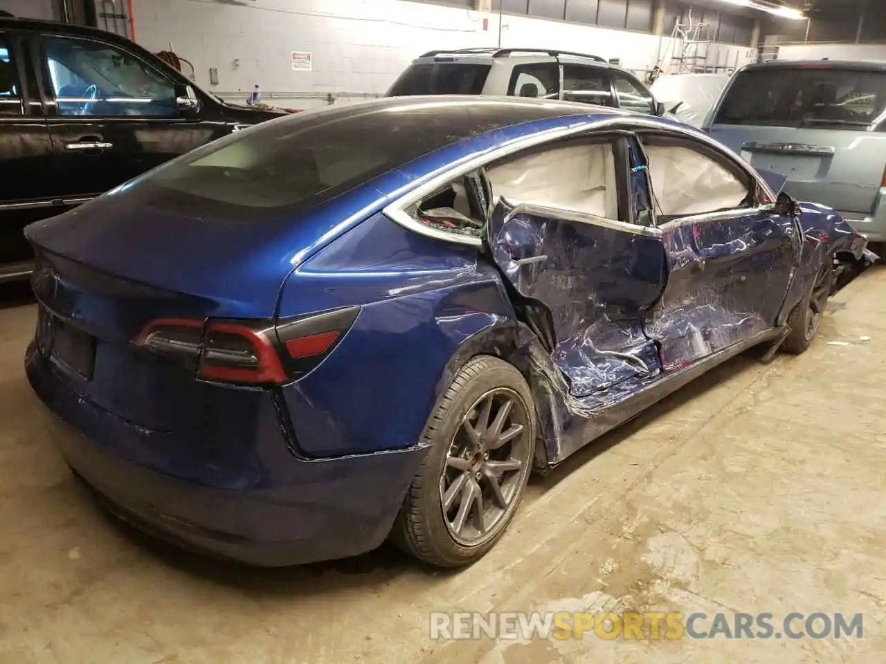 4 Photograph of a damaged car 5YJ3E1EA3LF590402 TESLA MODEL 3 2020