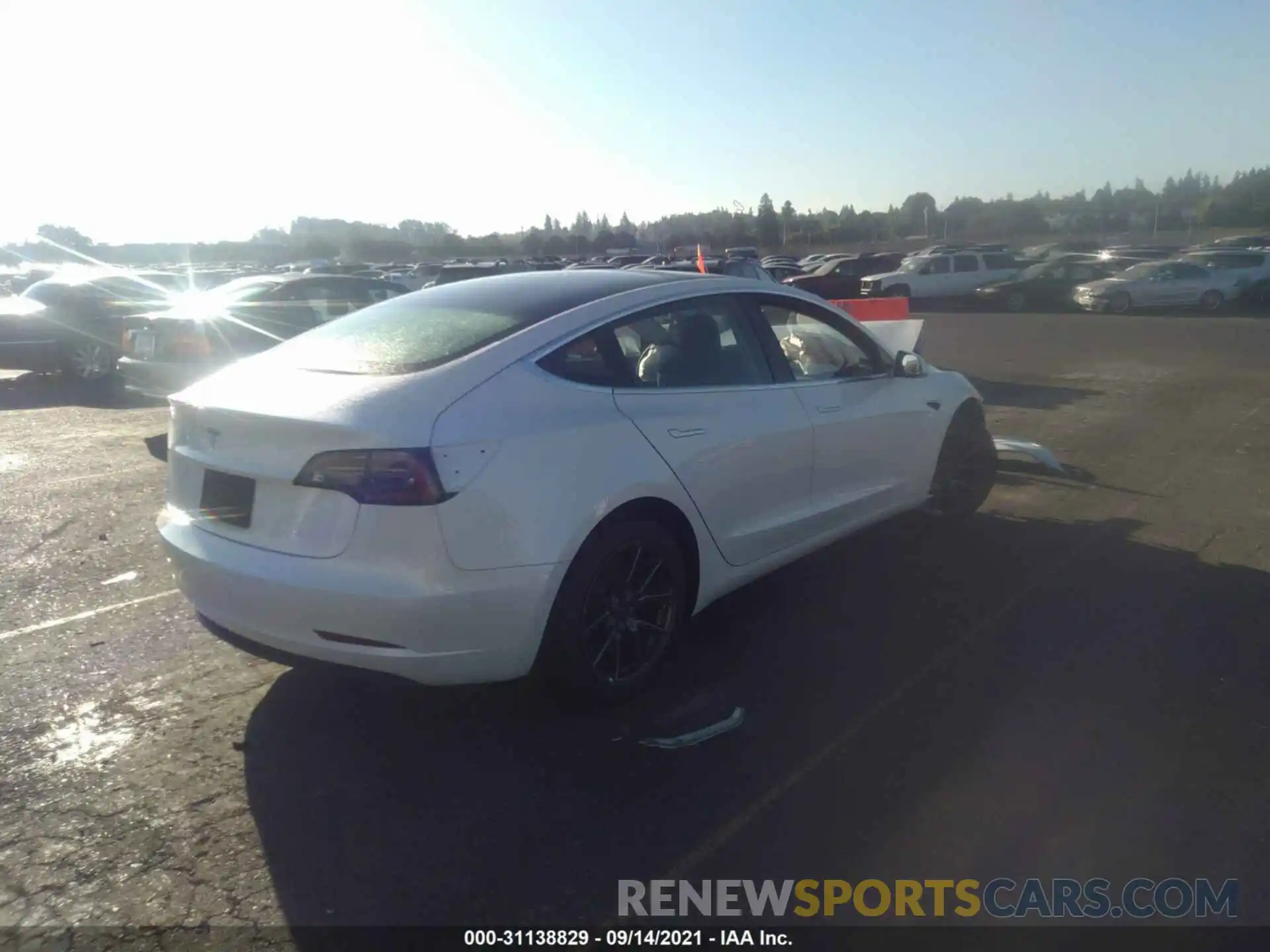 4 Photograph of a damaged car 5YJ3E1EA3LF590576 TESLA MODEL 3 2020