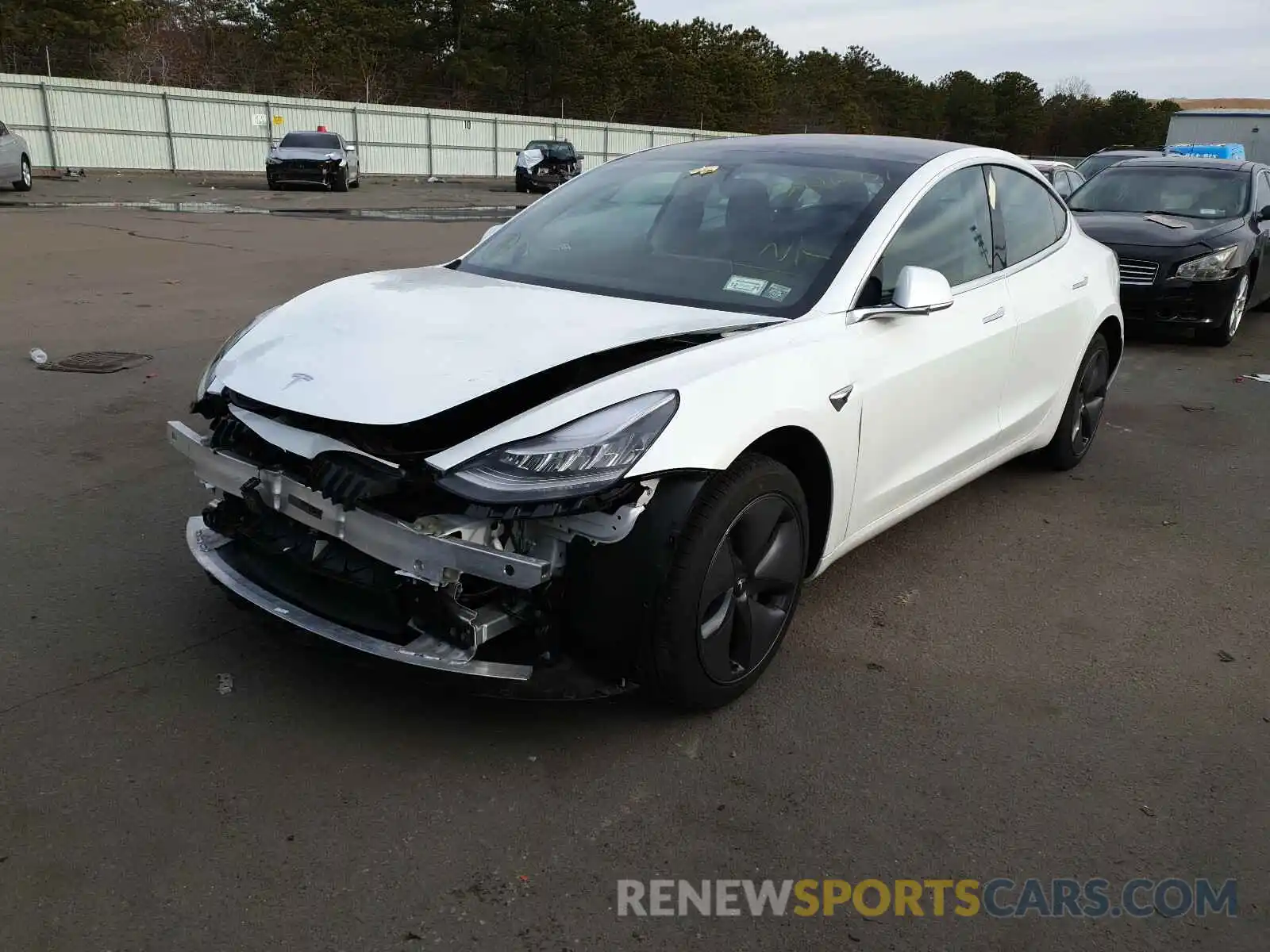 2 Photograph of a damaged car 5YJ3E1EA3LF597858 TESLA MODEL 3 2020