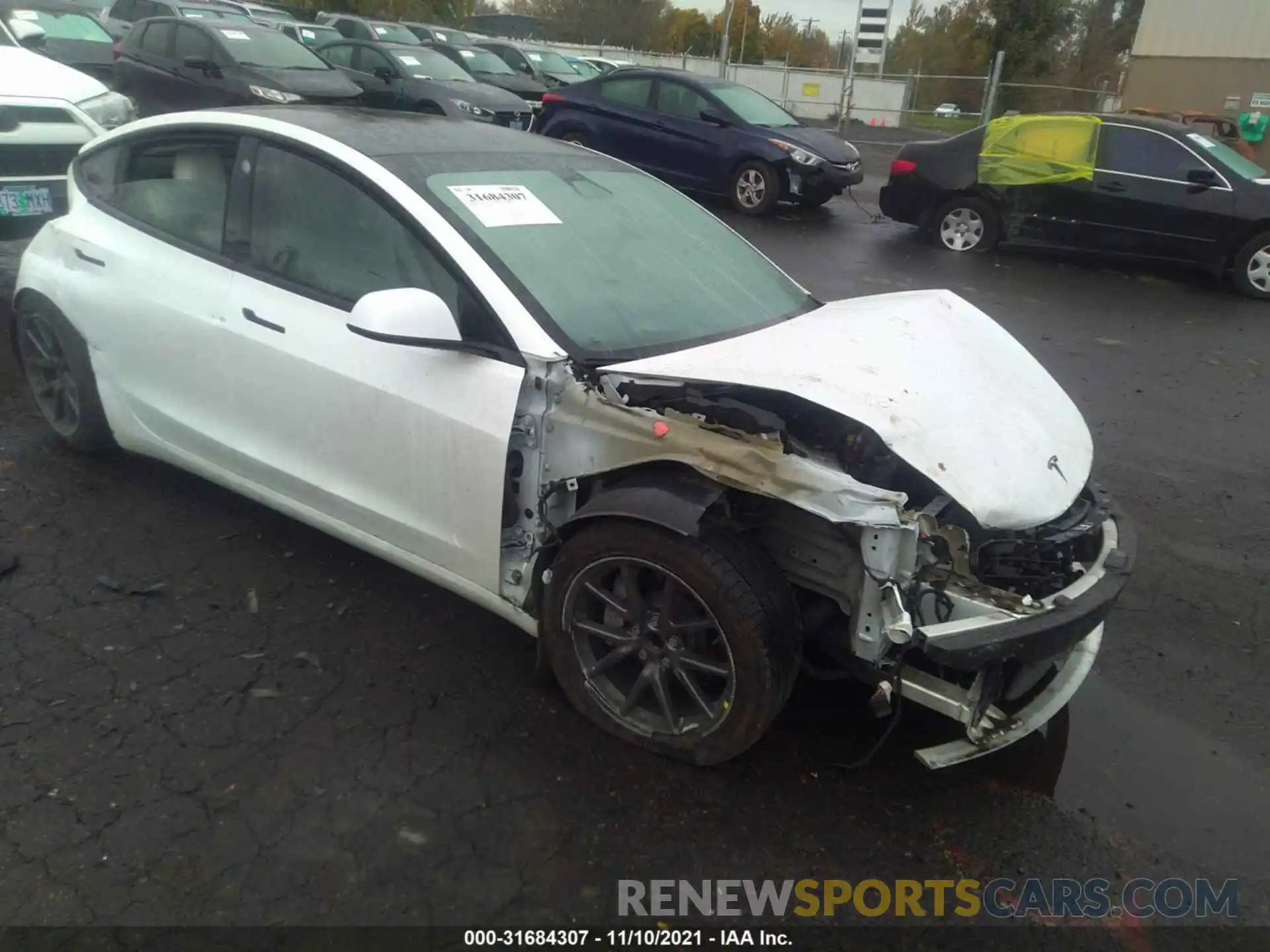 1 Photograph of a damaged car 5YJ3E1EA3LF599164 TESLA MODEL 3 2020