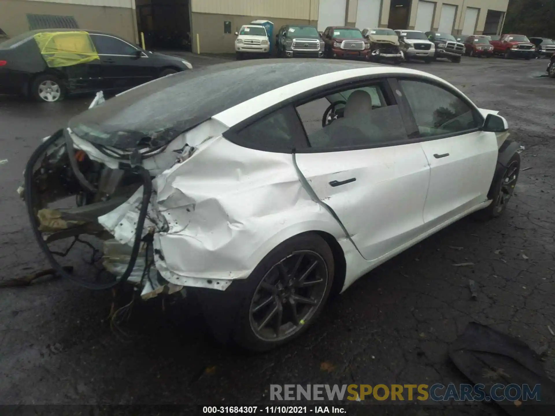 4 Photograph of a damaged car 5YJ3E1EA3LF599164 TESLA MODEL 3 2020