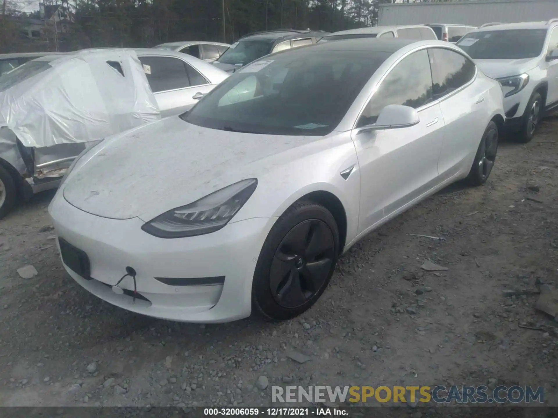 2 Photograph of a damaged car 5YJ3E1EA3LF632485 TESLA MODEL 3 2020