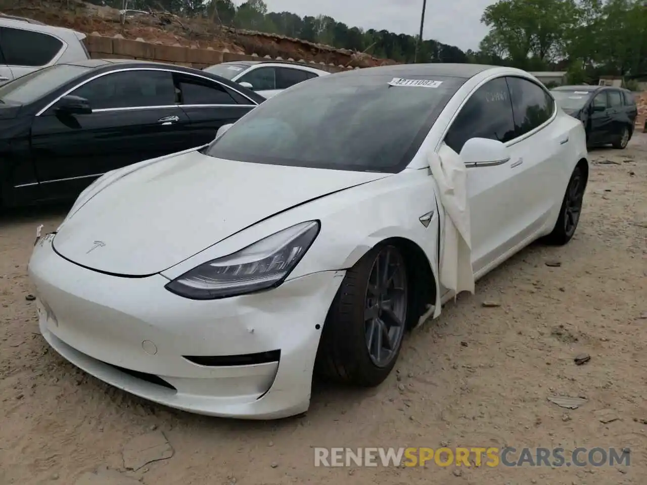 2 Photograph of a damaged car 5YJ3E1EA3LF645379 TESLA MODEL 3 2020