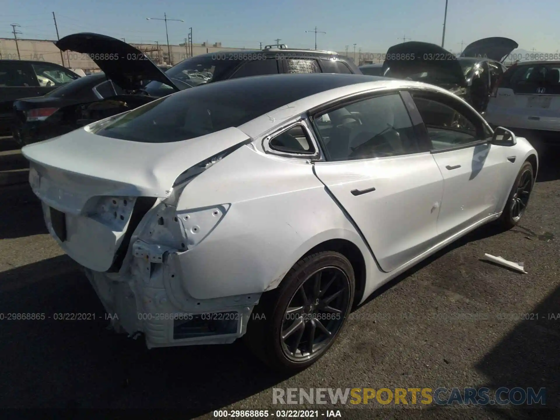 4 Photograph of a damaged car 5YJ3E1EA3LF710070 TESLA MODEL 3 2020