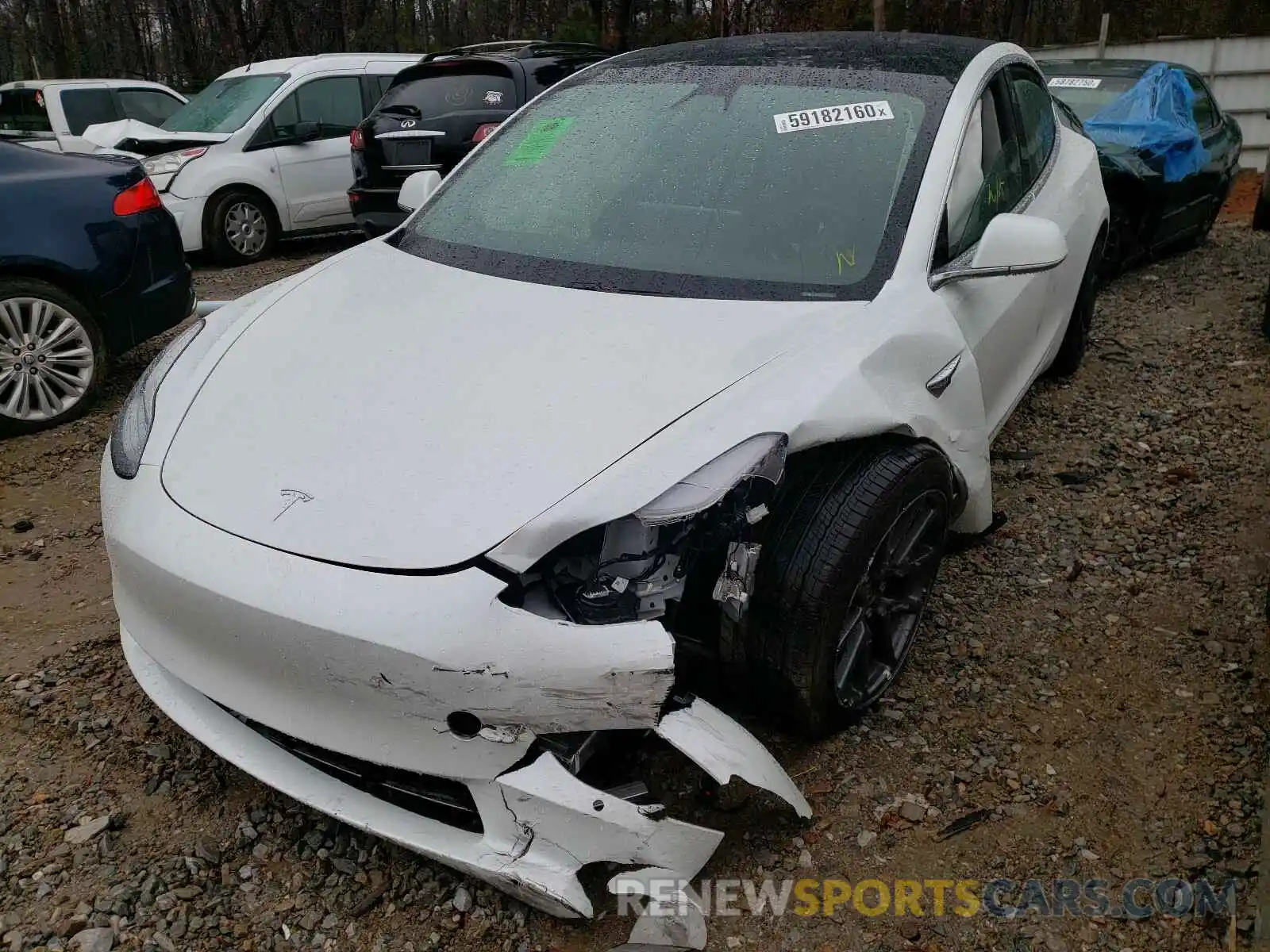 2 Photograph of a damaged car 5YJ3E1EA3LF740539 TESLA MODEL 3 2020