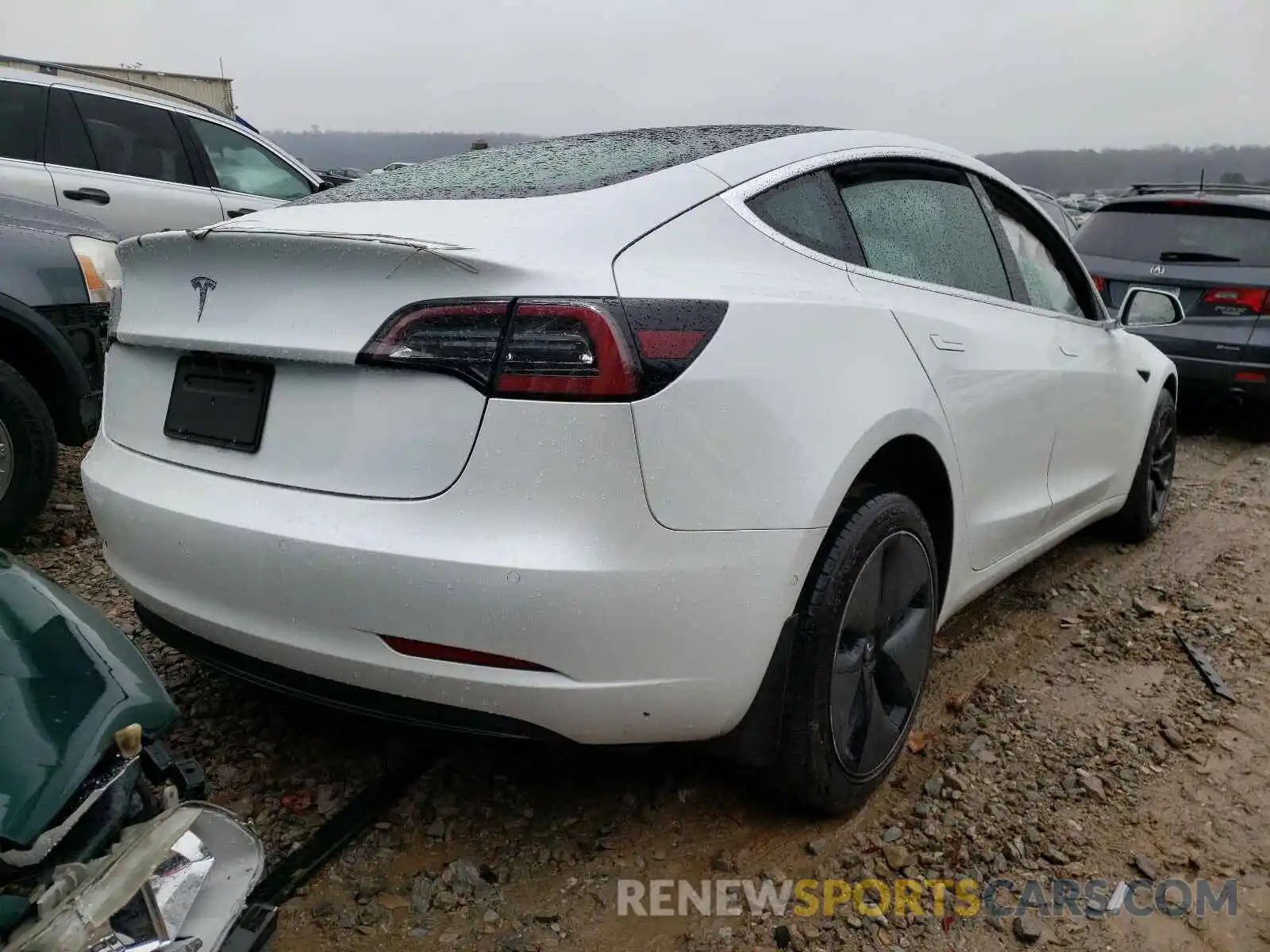 4 Photograph of a damaged car 5YJ3E1EA3LF740539 TESLA MODEL 3 2020