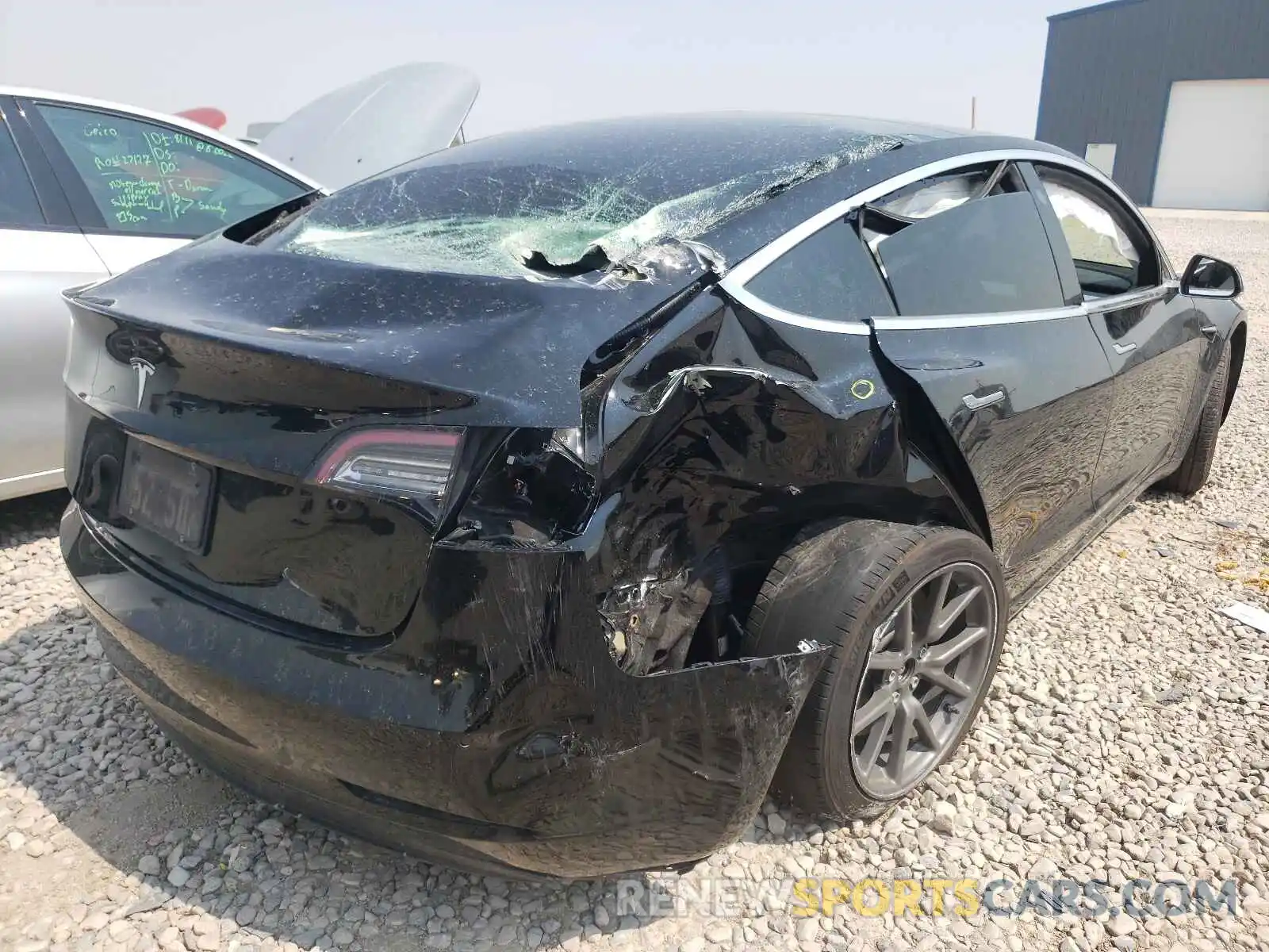 4 Photograph of a damaged car 5YJ3E1EA3LF743912 TESLA MODEL 3 2020