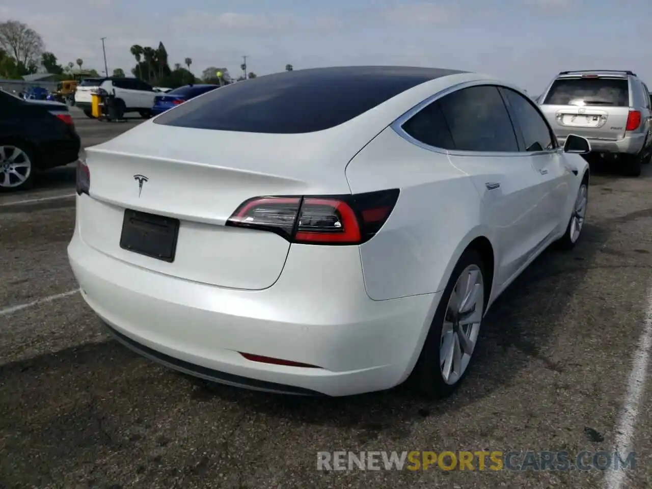 4 Photograph of a damaged car 5YJ3E1EA3LF744087 TESLA MODEL 3 2020