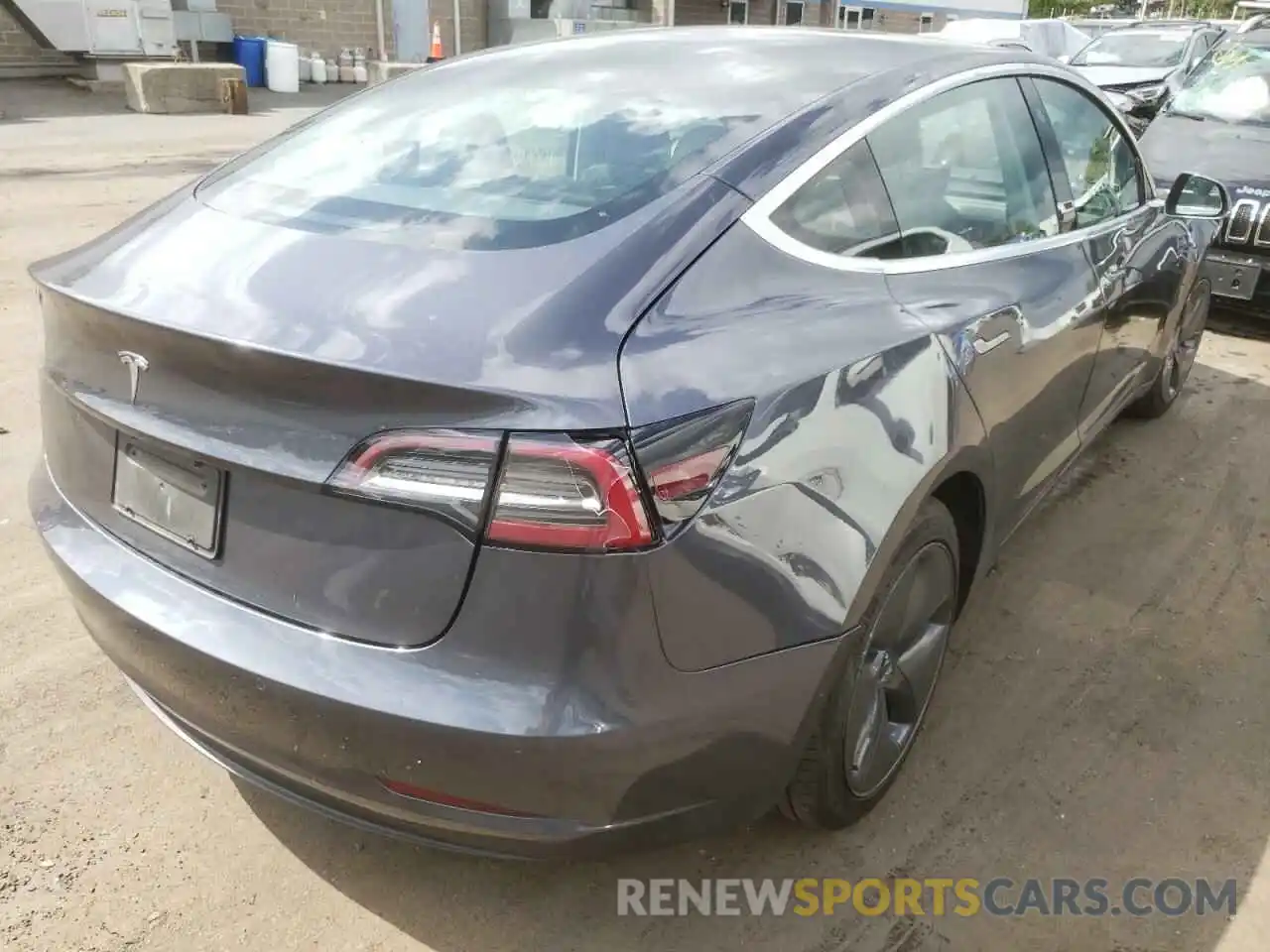 4 Photograph of a damaged car 5YJ3E1EA3LF796786 TESLA MODEL 3 2020