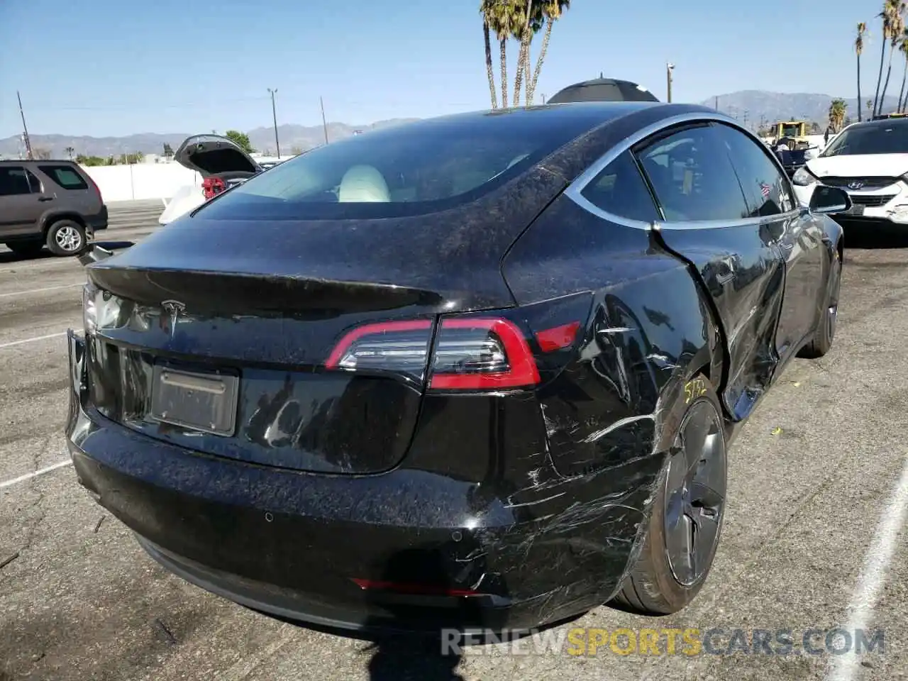 4 Photograph of a damaged car 5YJ3E1EA3LF804711 TESLA MODEL 3 2020