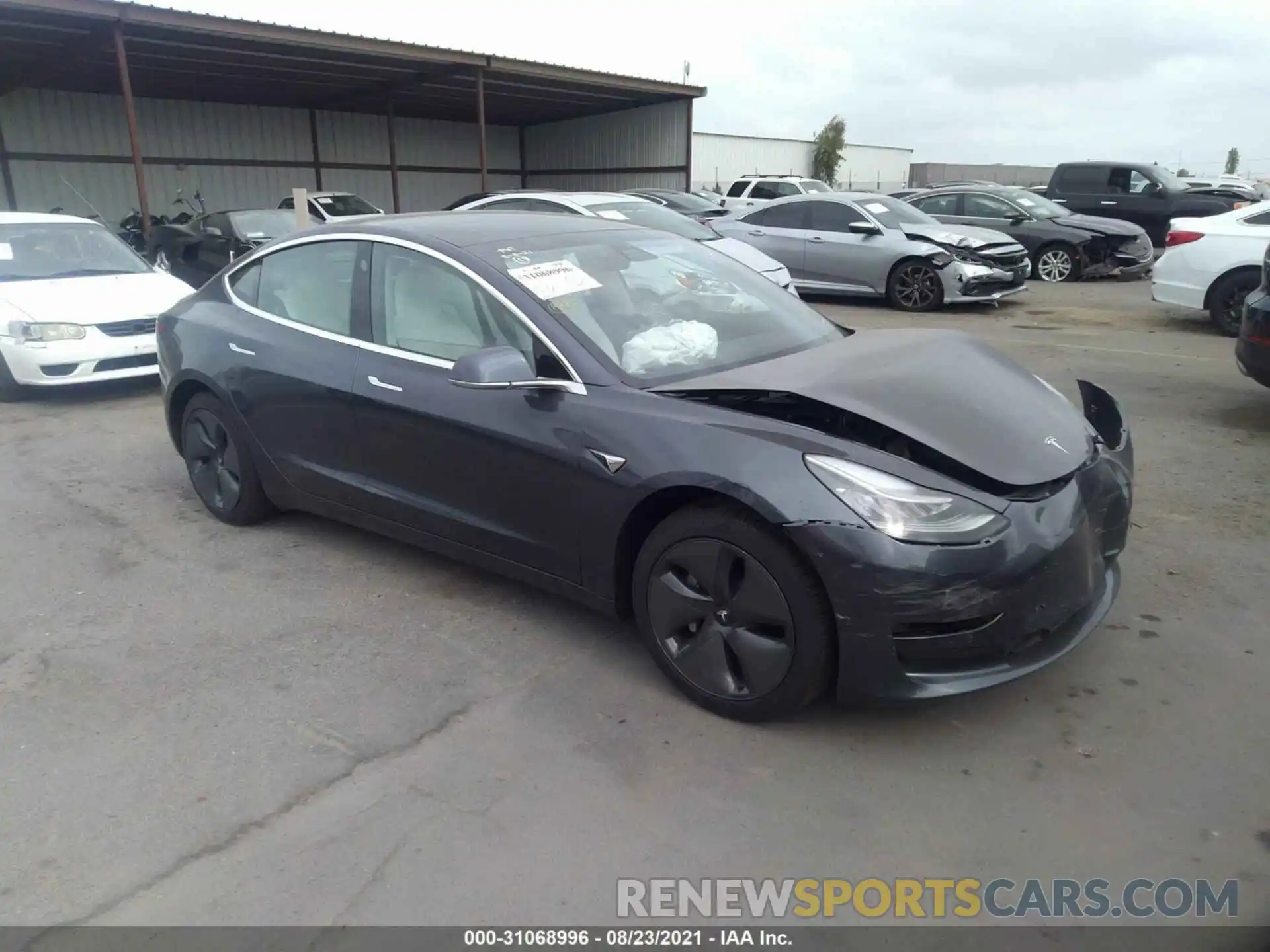 1 Photograph of a damaged car 5YJ3E1EA3LF808080 TESLA MODEL 3 2020