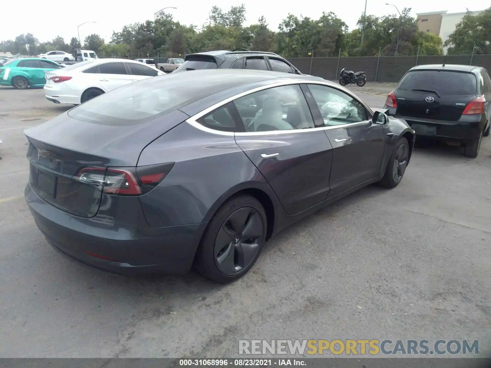 4 Photograph of a damaged car 5YJ3E1EA3LF808080 TESLA MODEL 3 2020