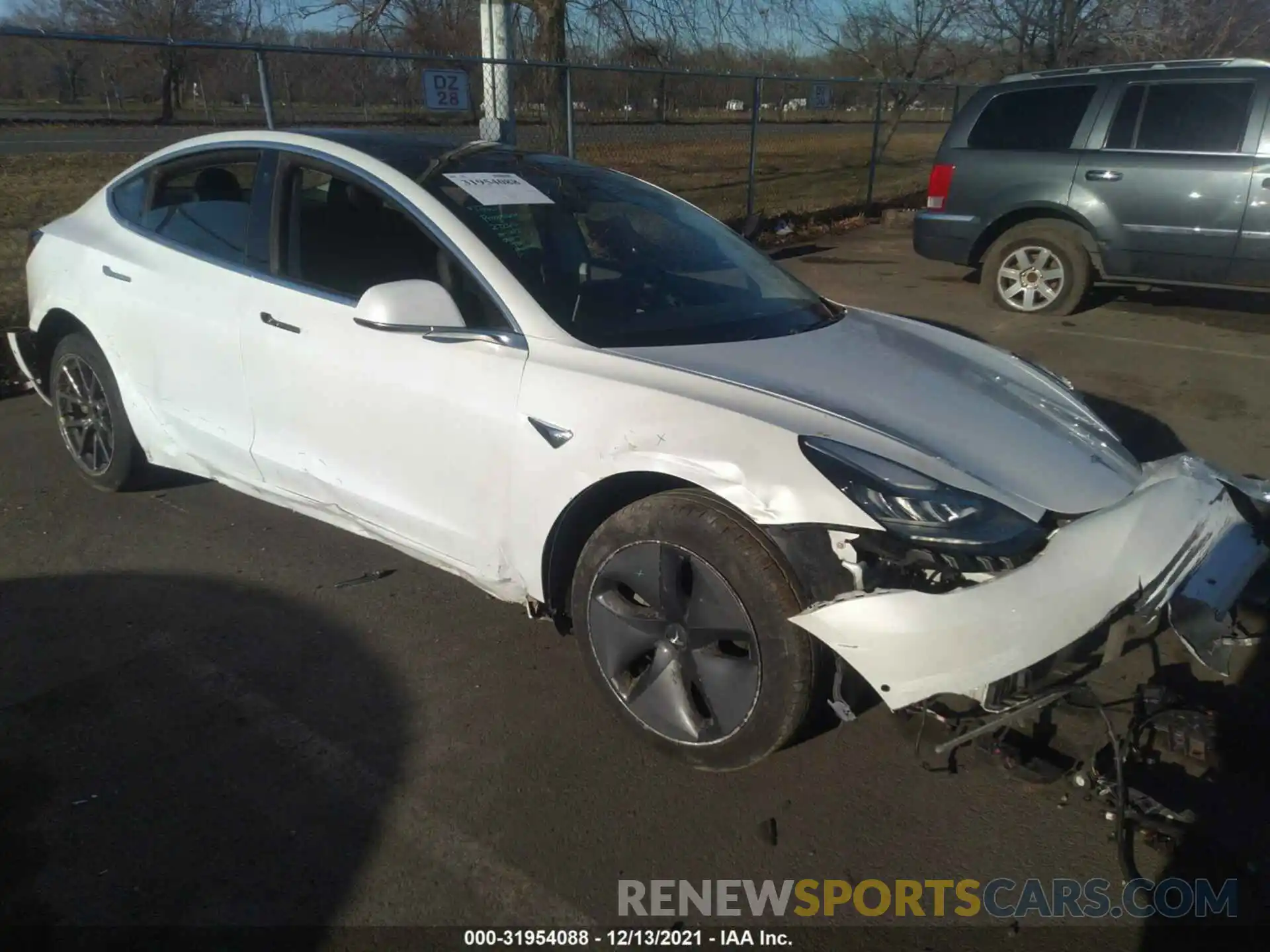 1 Photograph of a damaged car 5YJ3E1EA4LF597519 TESLA MODEL 3 2020