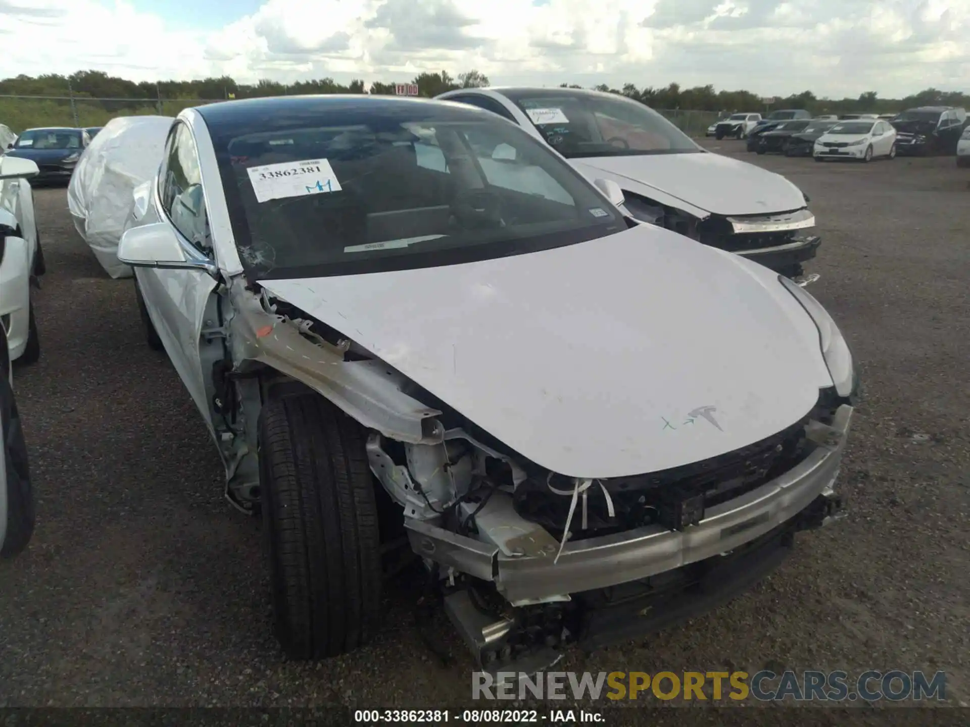 1 Photograph of a damaged car 5YJ3E1EA4LF597794 TESLA MODEL 3 2020