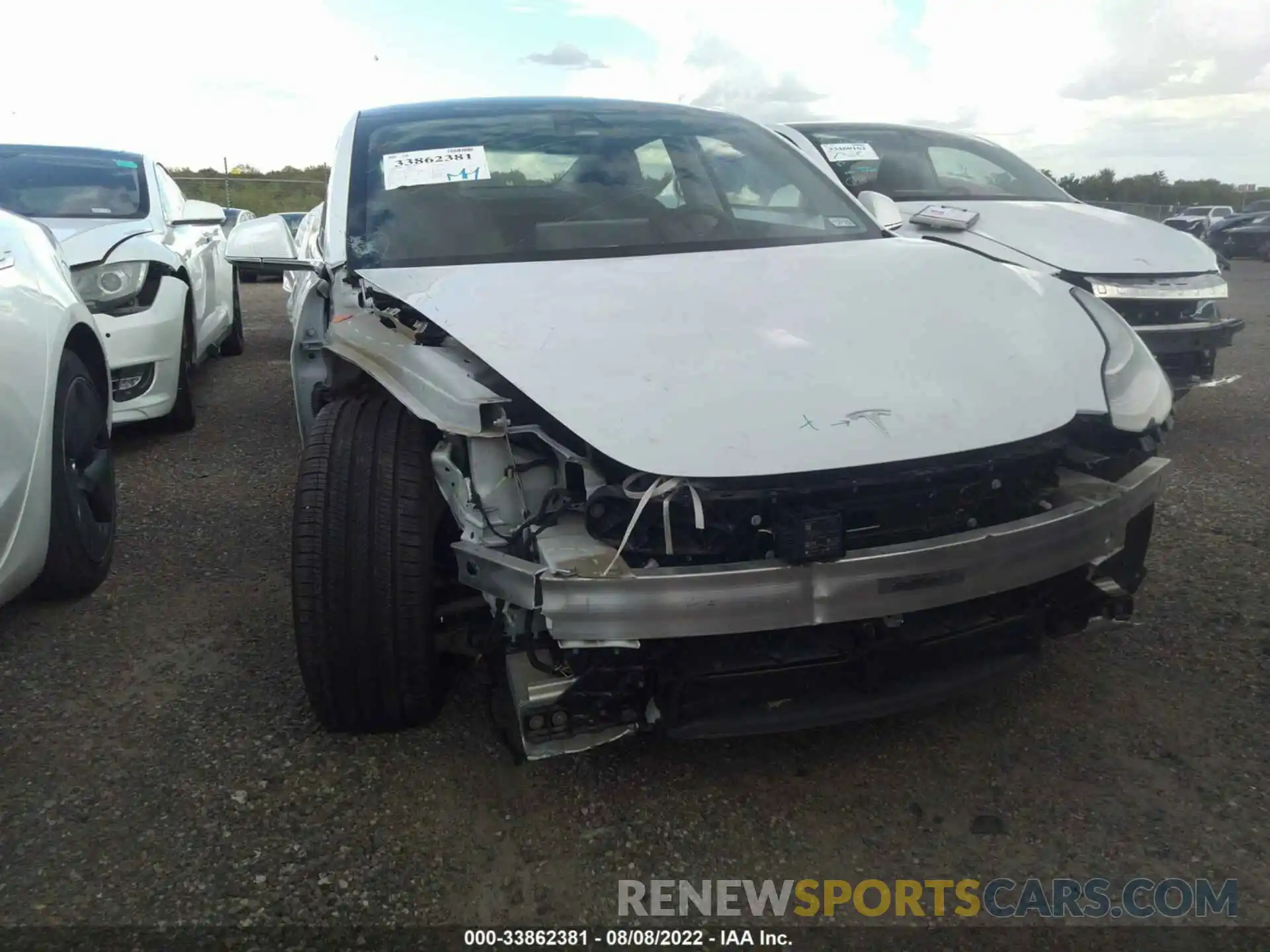 6 Photograph of a damaged car 5YJ3E1EA4LF597794 TESLA MODEL 3 2020