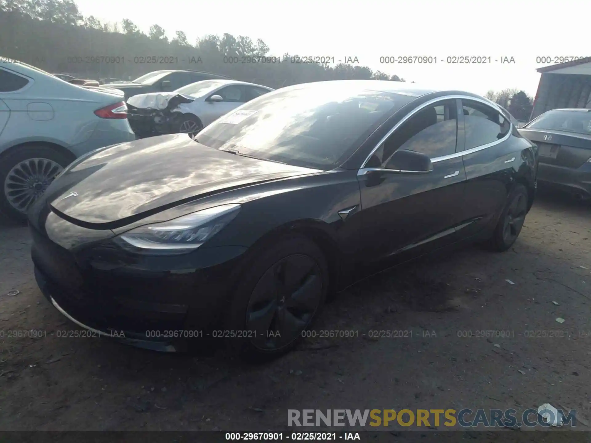 2 Photograph of a damaged car 5YJ3E1EA4LF606333 TESLA MODEL 3 2020