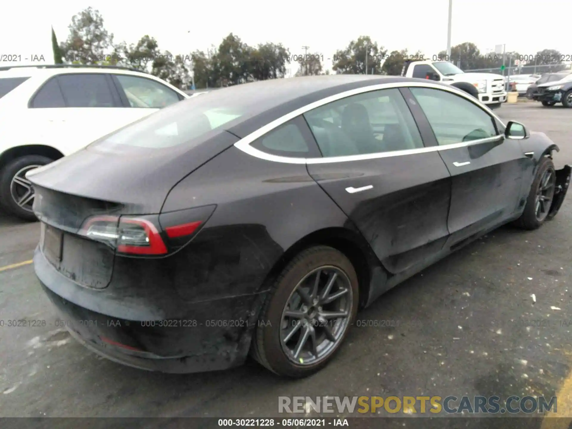 4 Photograph of a damaged car 5YJ3E1EA4LF657640 TESLA MODEL 3 2020