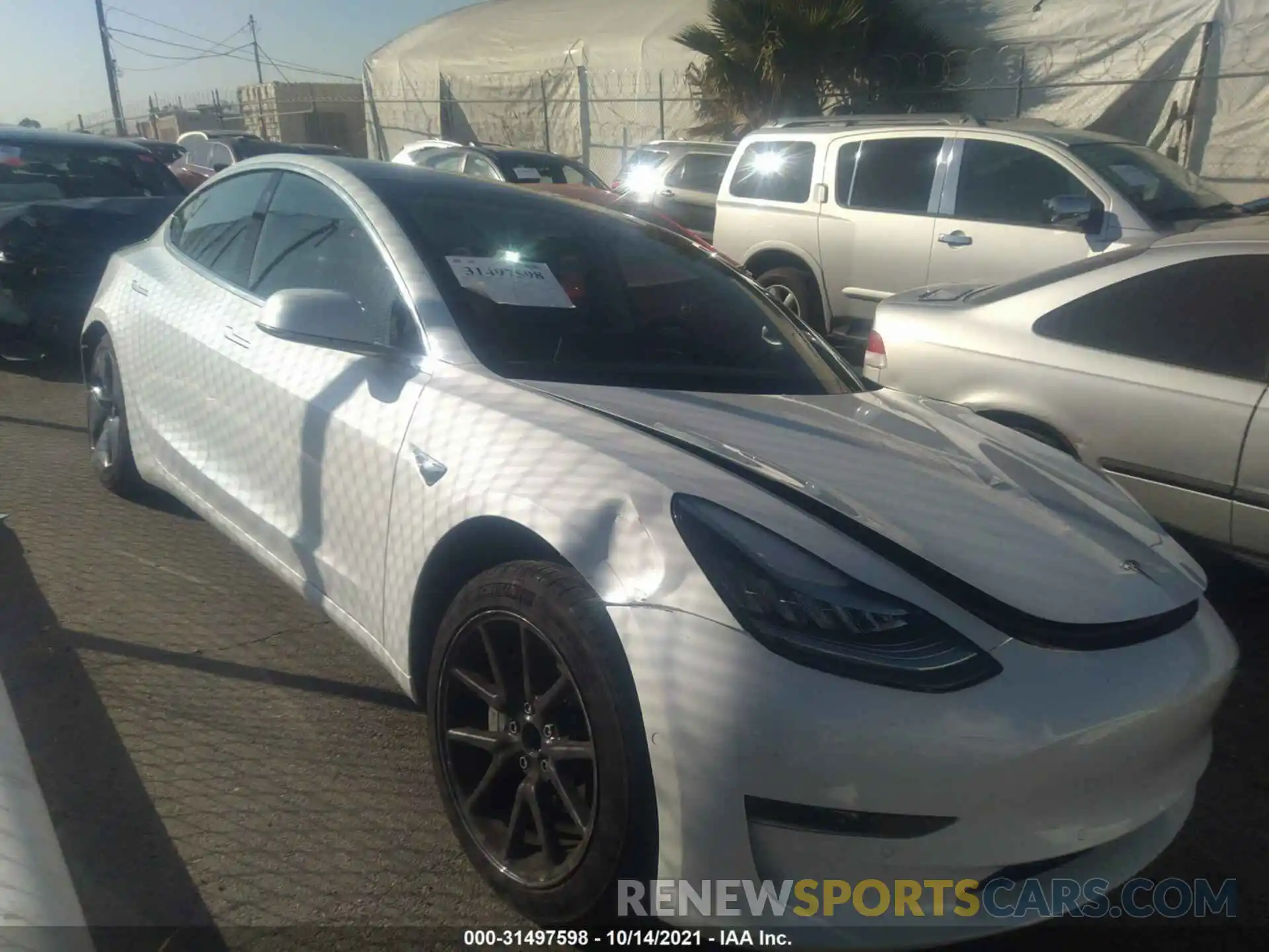 1 Photograph of a damaged car 5YJ3E1EA4LF662367 TESLA MODEL 3 2020