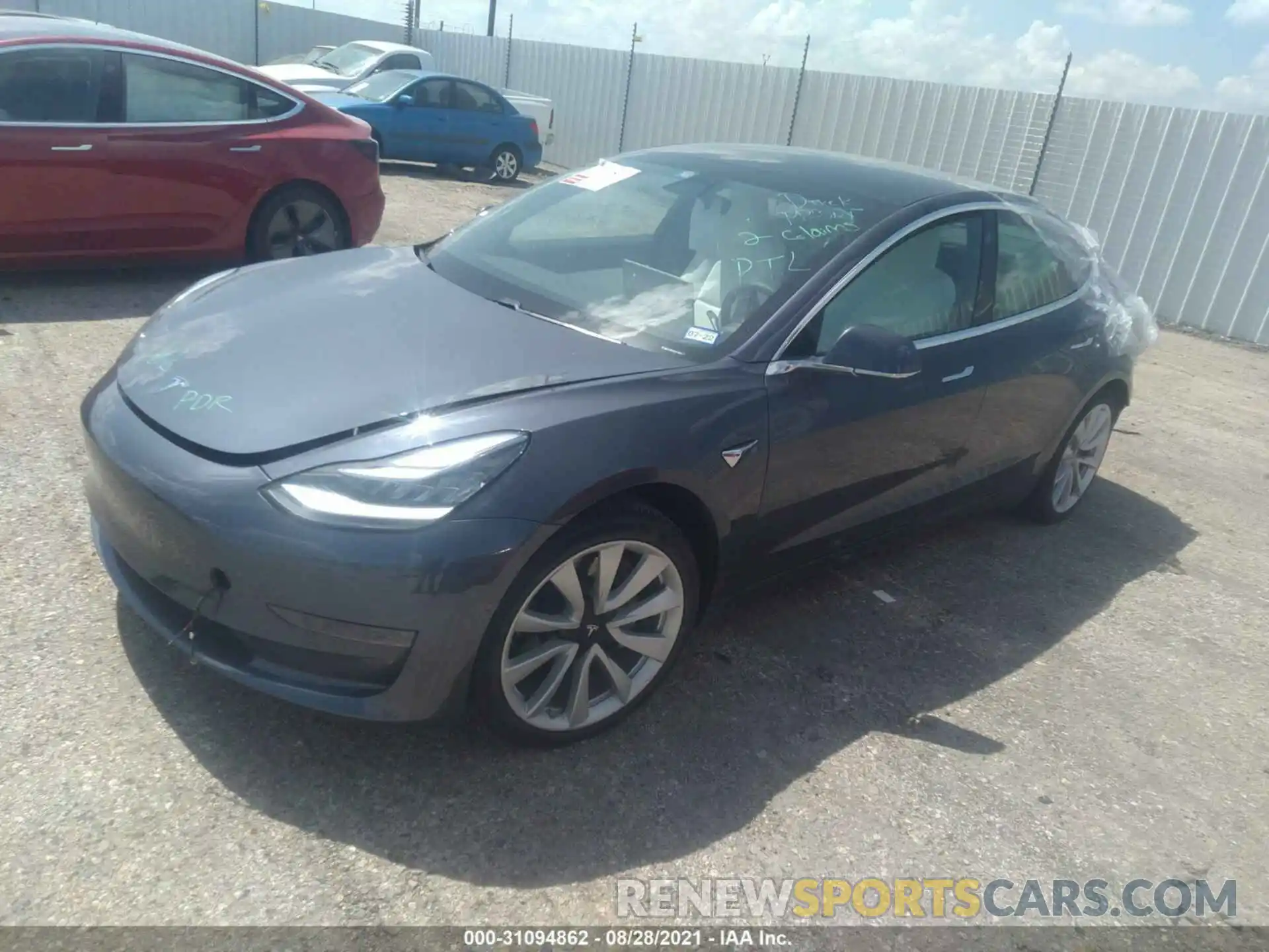 2 Photograph of a damaged car 5YJ3E1EA4LF741201 TESLA MODEL 3 2020