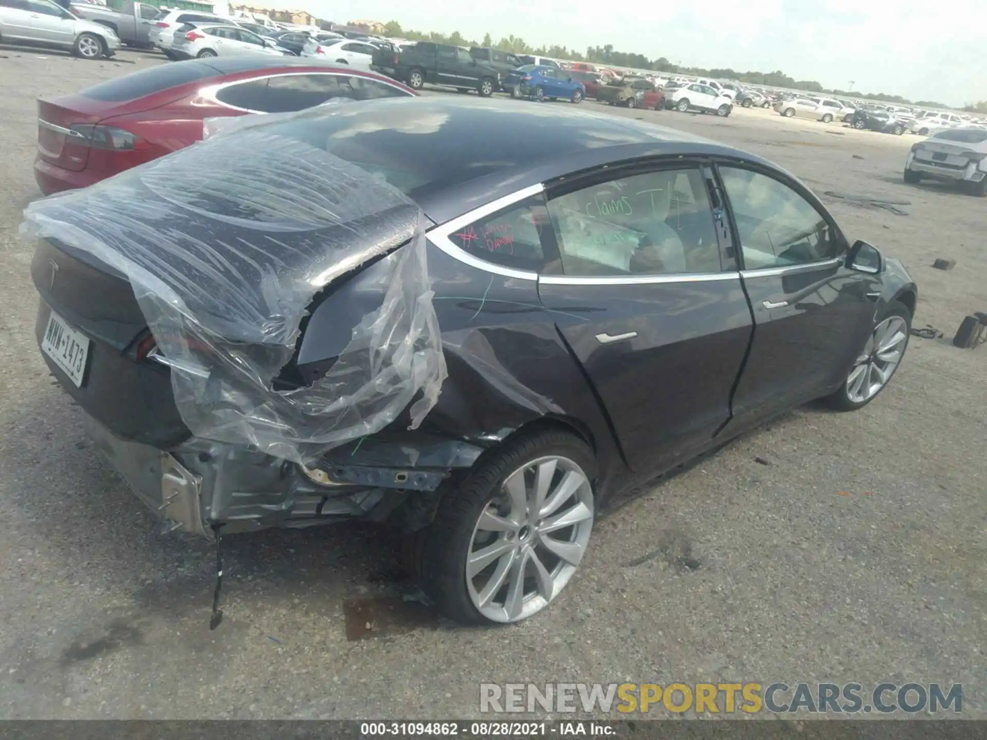 4 Photograph of a damaged car 5YJ3E1EA4LF741201 TESLA MODEL 3 2020