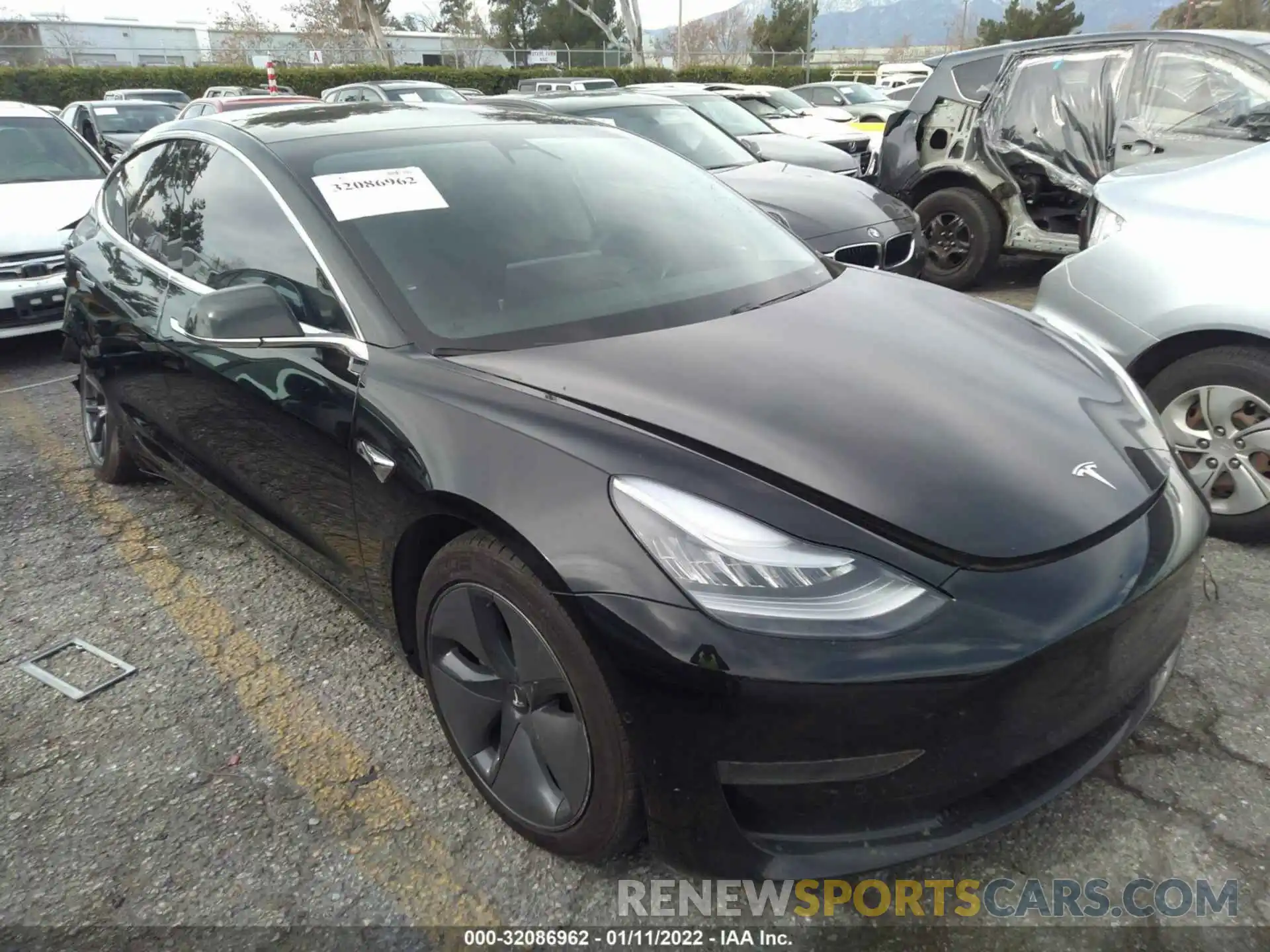 1 Photograph of a damaged car 5YJ3E1EA4LF743224 TESLA MODEL 3 2020