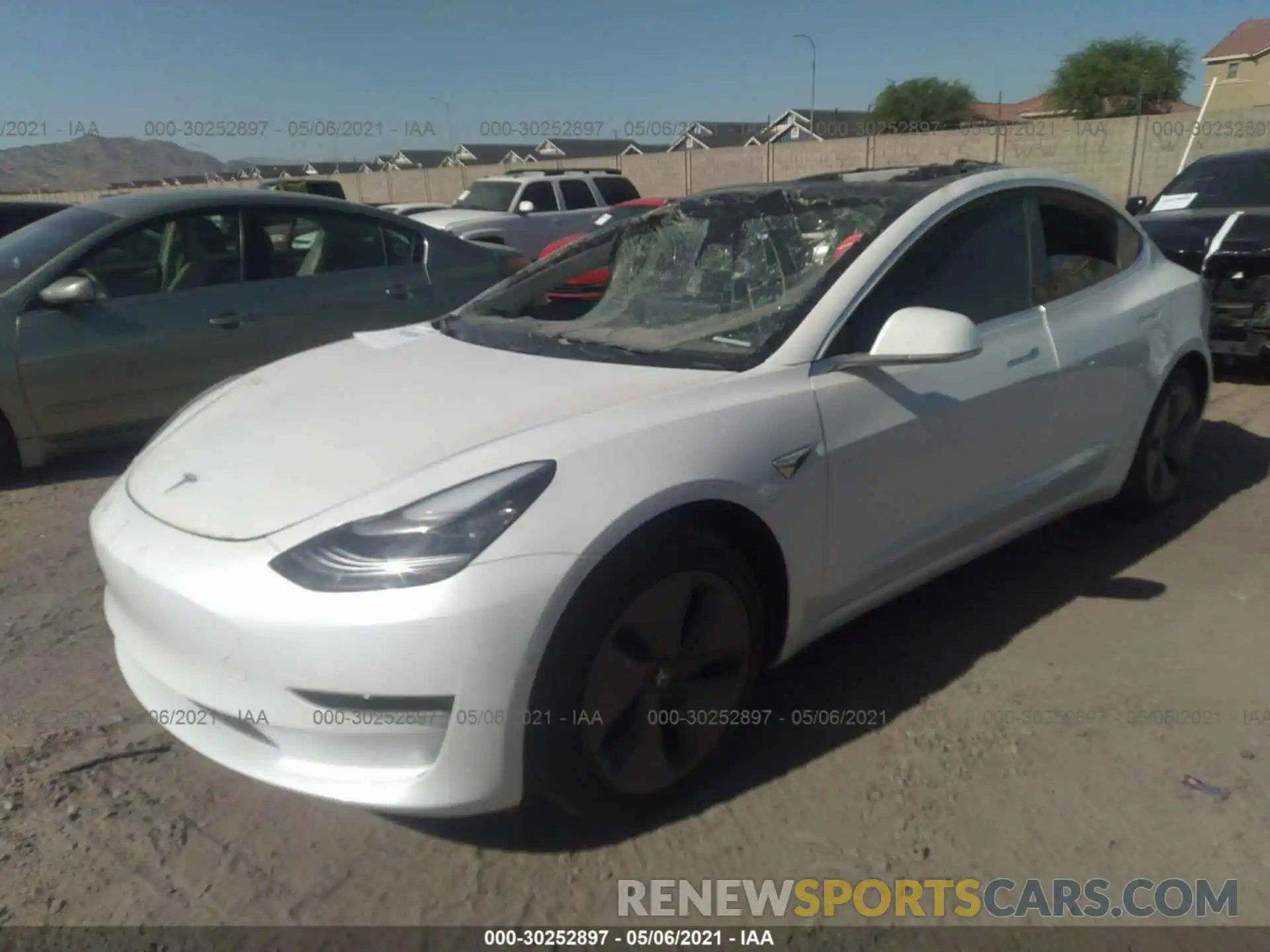 2 Photograph of a damaged car 5YJ3E1EA4LF745152 TESLA MODEL 3 2020