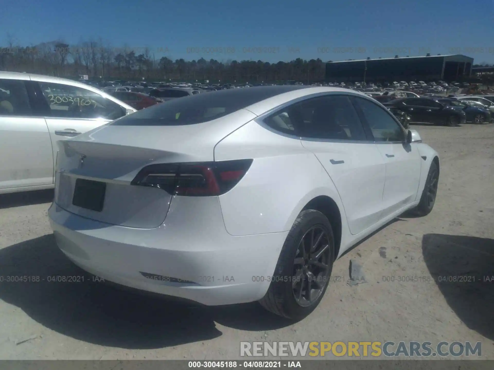 4 Photograph of a damaged car 5YJ3E1EA4LF785280 TESLA MODEL 3 2020