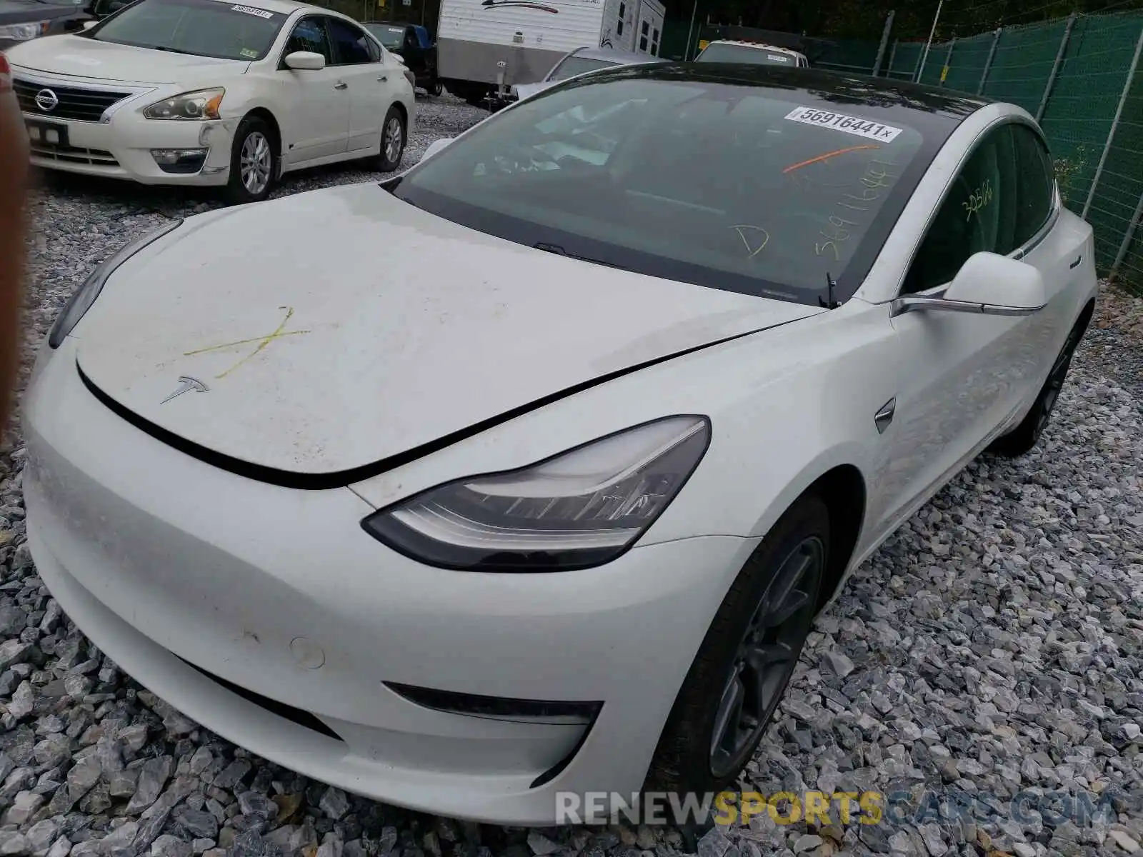 2 Photograph of a damaged car 5YJ3E1EA4LF792584 TESLA MODEL 3 2020