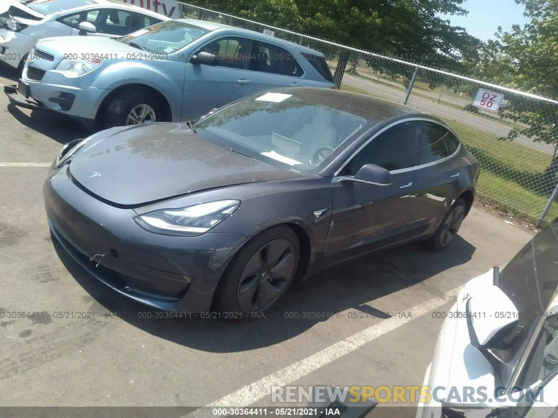 2 Photograph of a damaged car 5YJ3E1EA4LF797669 TESLA MODEL 3 2020