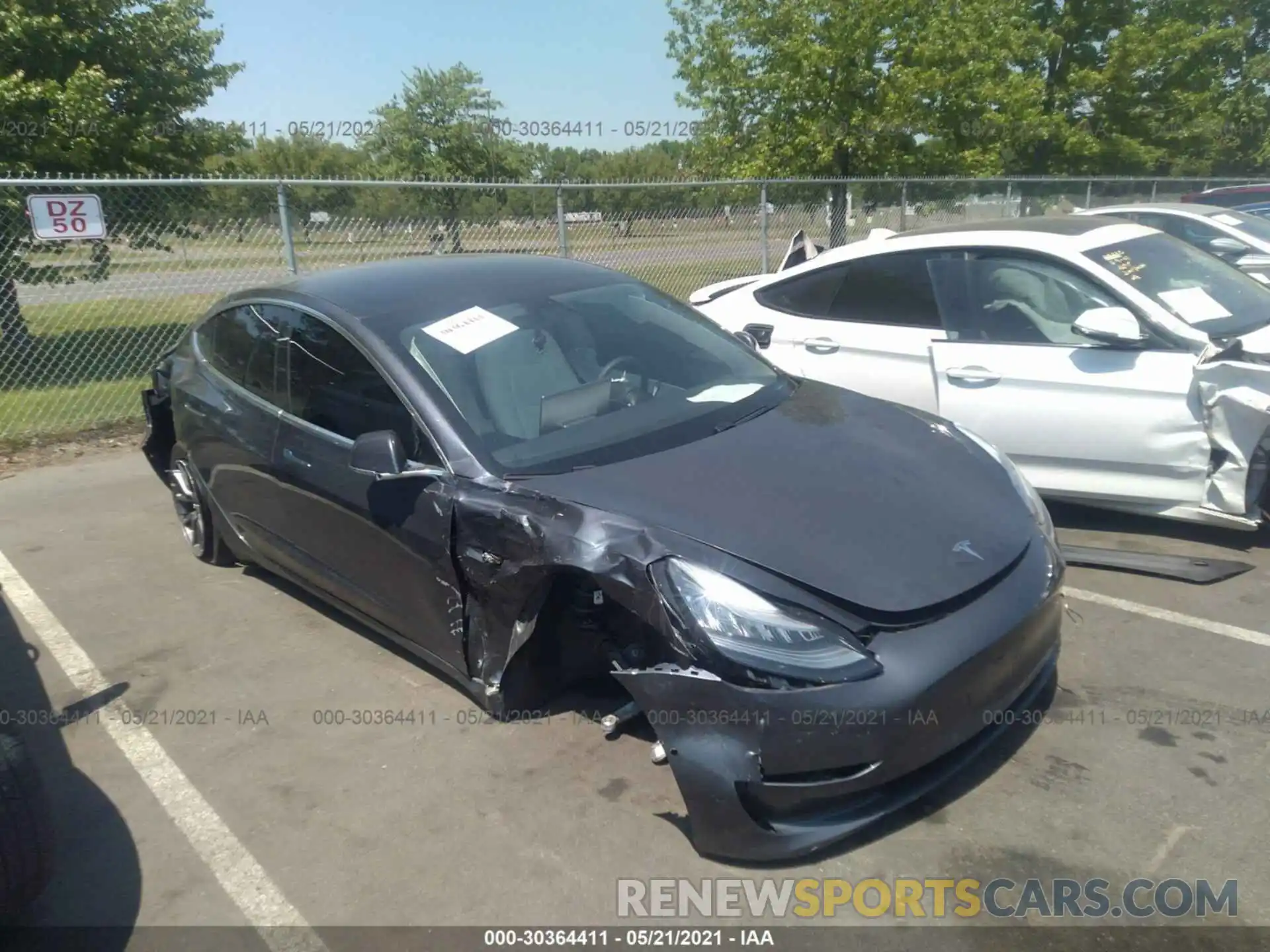 6 Photograph of a damaged car 5YJ3E1EA4LF797669 TESLA MODEL 3 2020