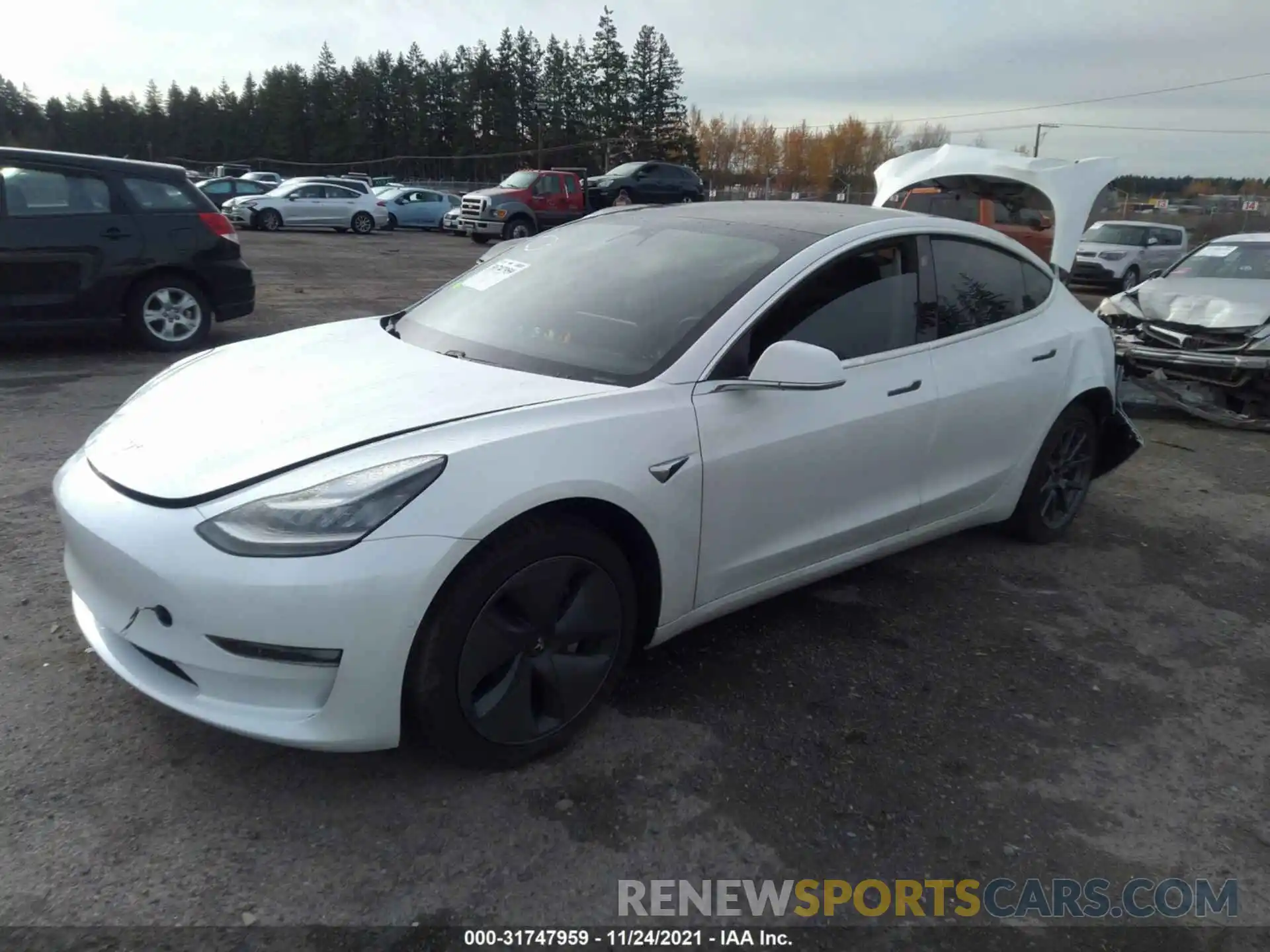 2 Photograph of a damaged car 5YJ3E1EA4LF798532 TESLA MODEL 3 2020