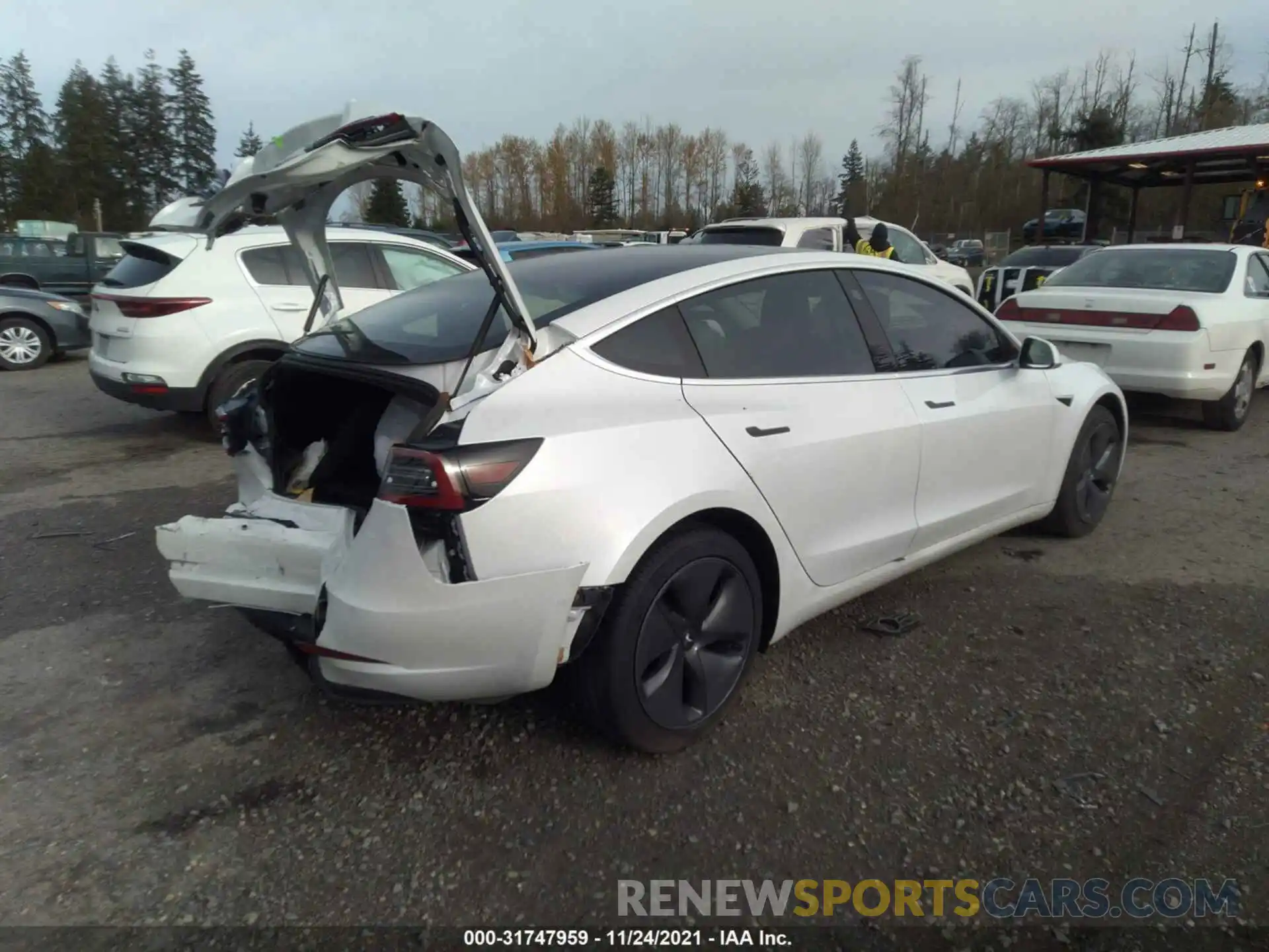 4 Photograph of a damaged car 5YJ3E1EA4LF798532 TESLA MODEL 3 2020