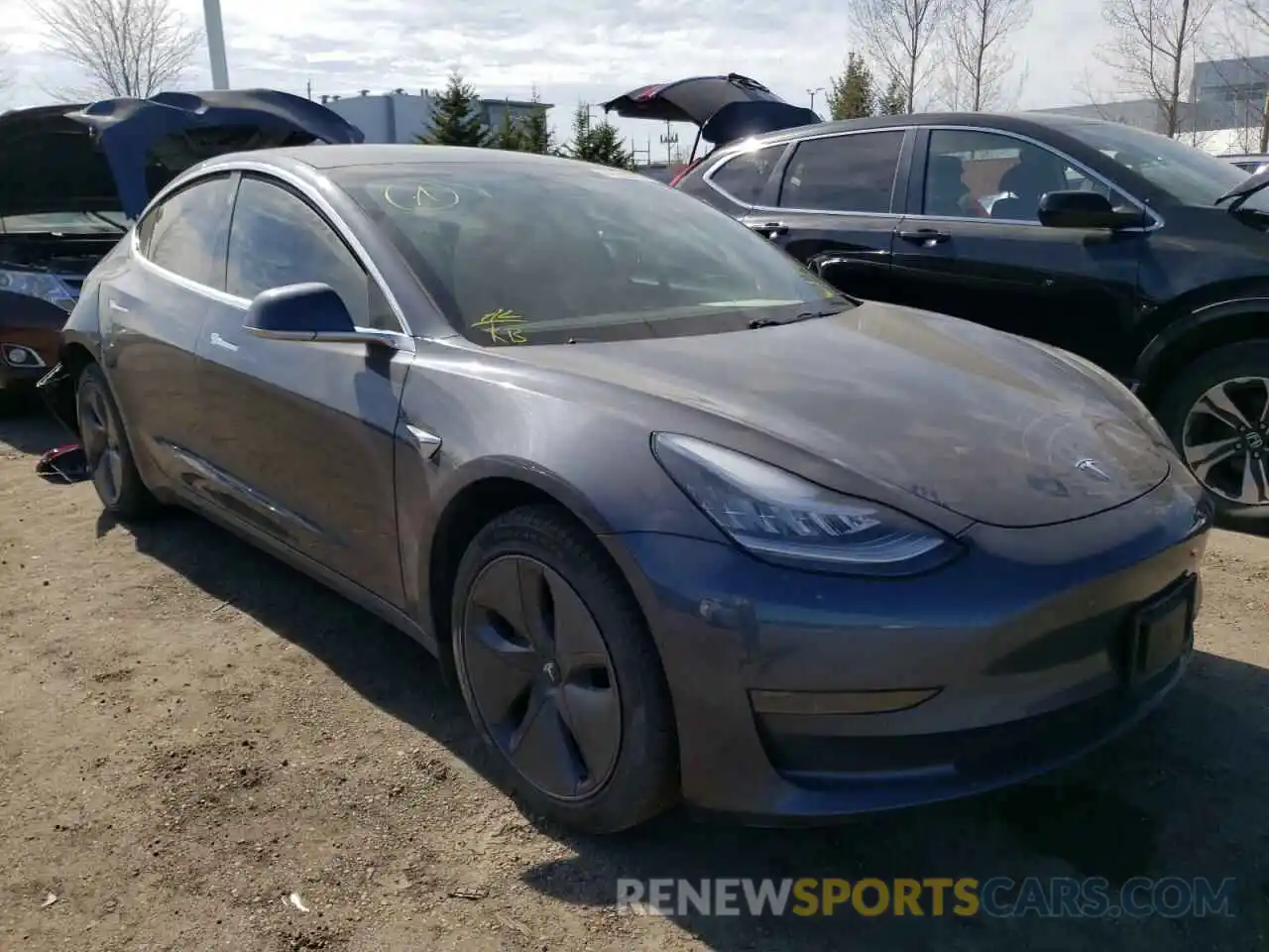 1 Photograph of a damaged car 5YJ3E1EA4LF803437 TESLA MODEL 3 2020