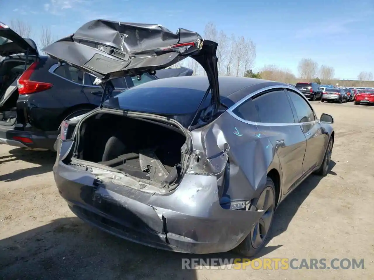 4 Photograph of a damaged car 5YJ3E1EA4LF803437 TESLA MODEL 3 2020