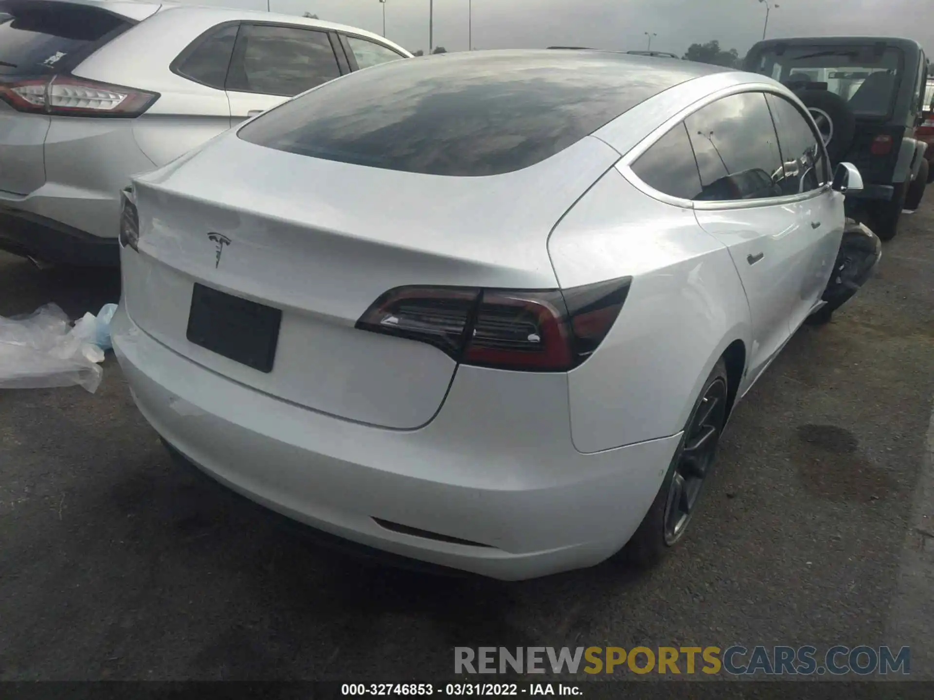 4 Photograph of a damaged car 5YJ3E1EA4LF807469 TESLA MODEL 3 2020